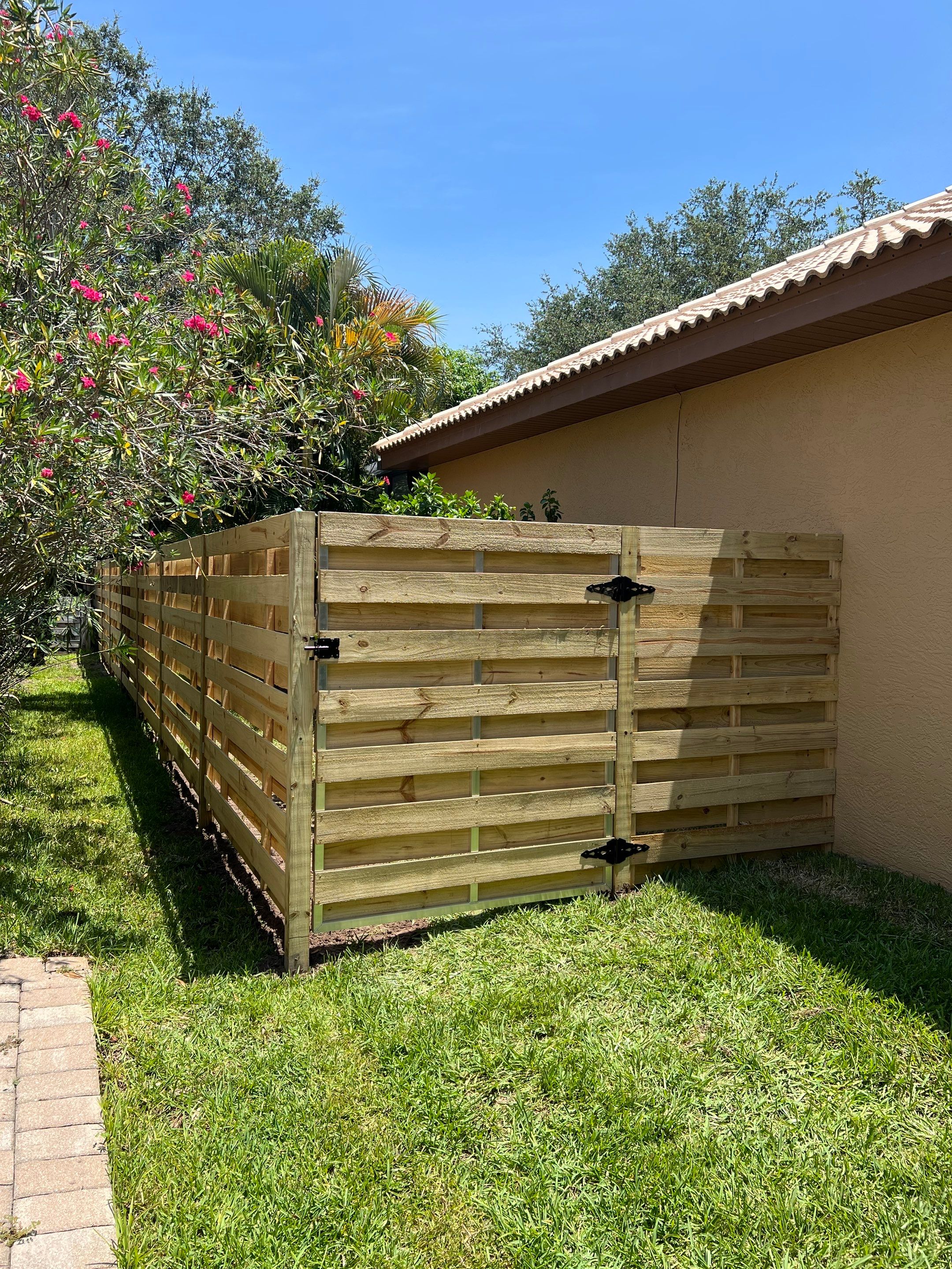 Osprey, FL 6ft. Tall Treated Horizontal Shadowbox Wood Fence by Asap fence and gates, LLC