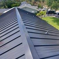 24ga 1.5" Mechanical Seam Matte Black by Total Roofing System The Metal Roof Experts
