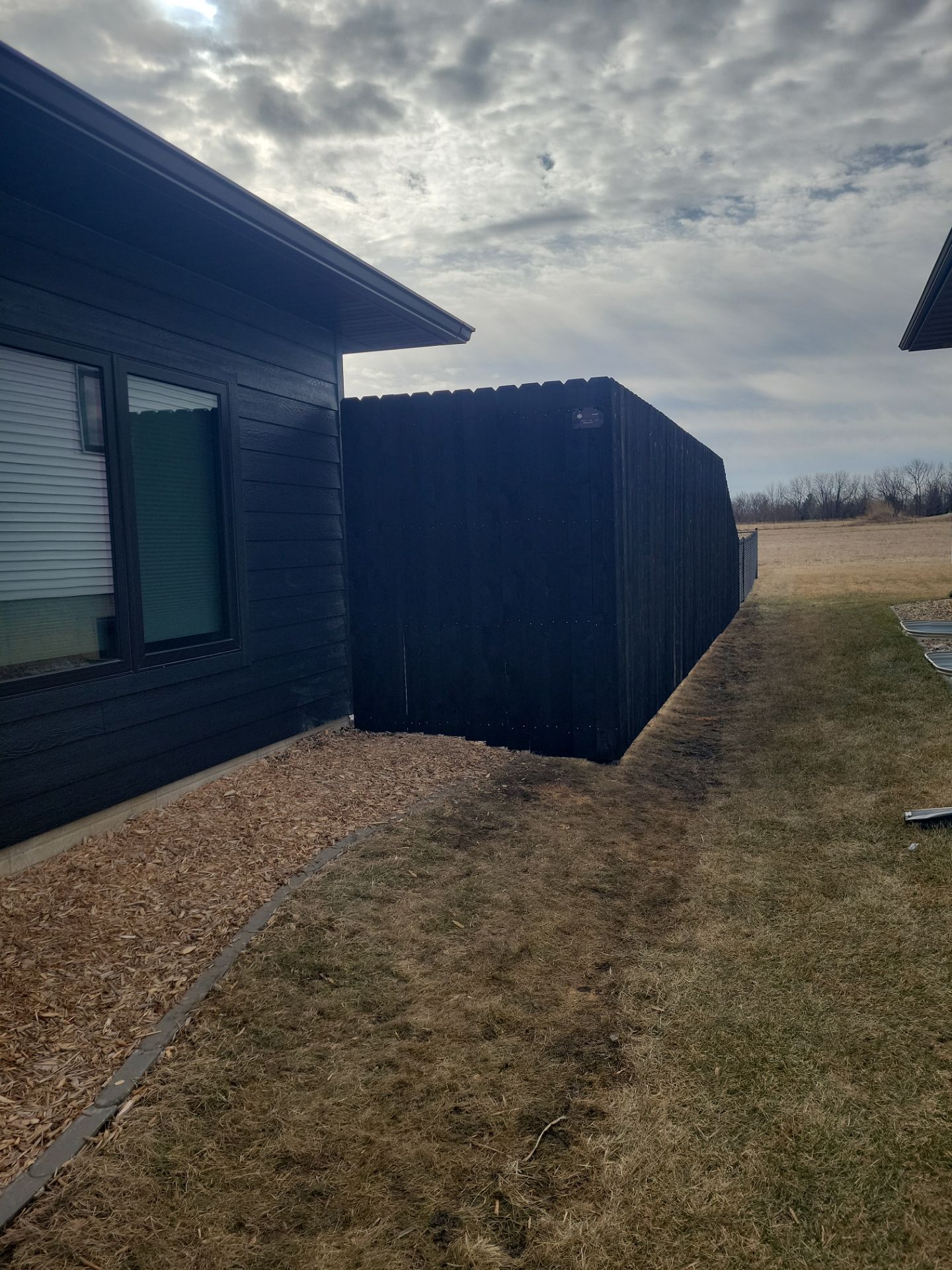 Residential Fencing Installation for New Construction Homes in Cedar Falls by Perfect Picket Fence and Stain