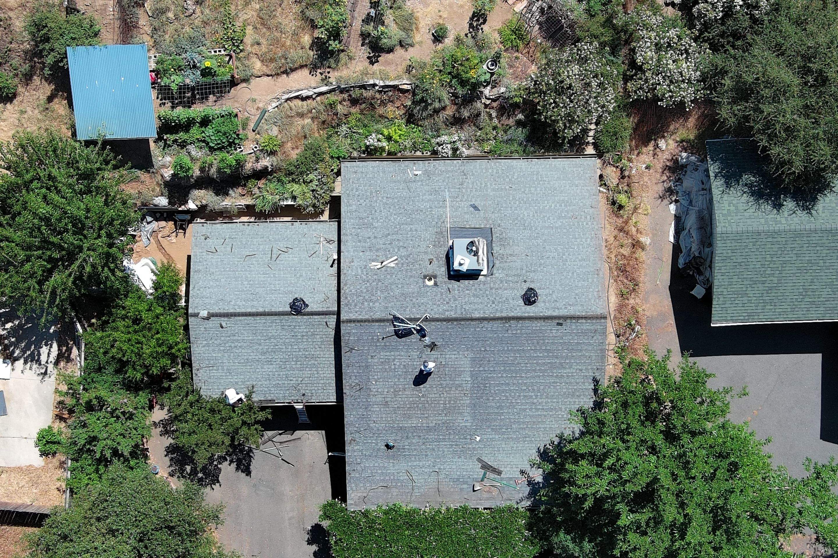 Metal roofing installation using ASC Standing Seam metal by Straight Edge Roofing Inc