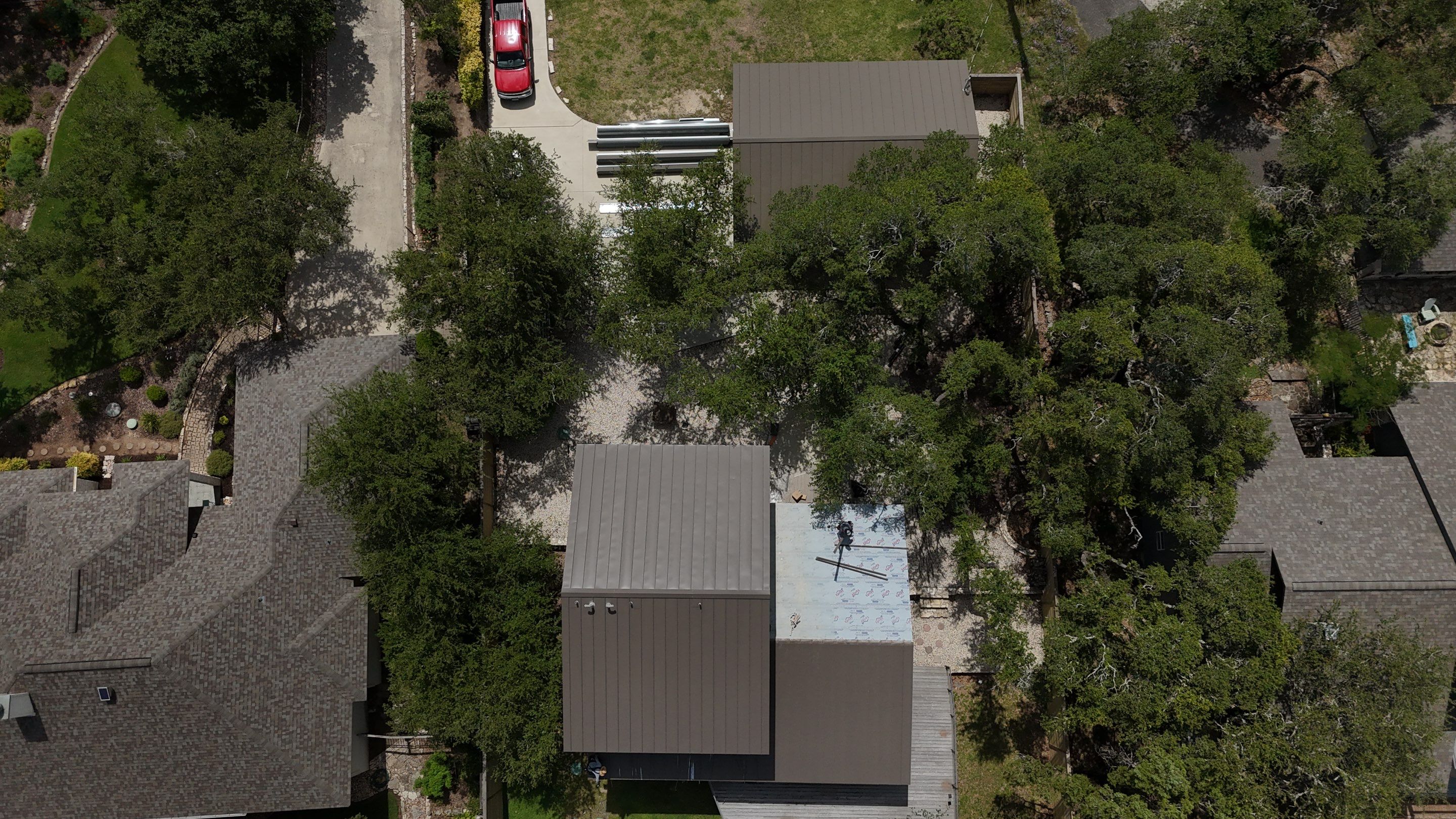 Residential Roof Replacement using 24 GA Double-Lock - Medium Bronze by Action Exteriors Austin