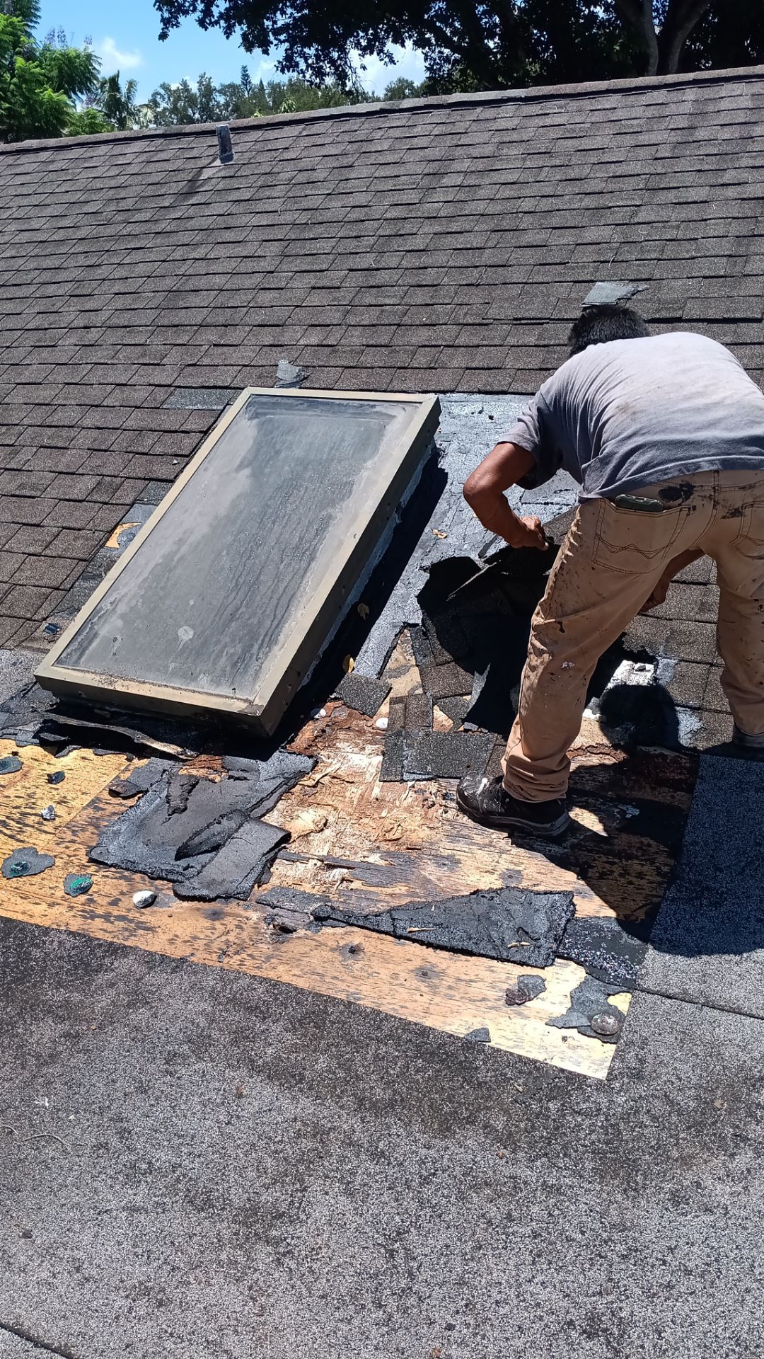 REPLACE NON APPROVED SKYLIGHT ALONG WITH CLOGED GUTTER by Morton Roofing, Inc.