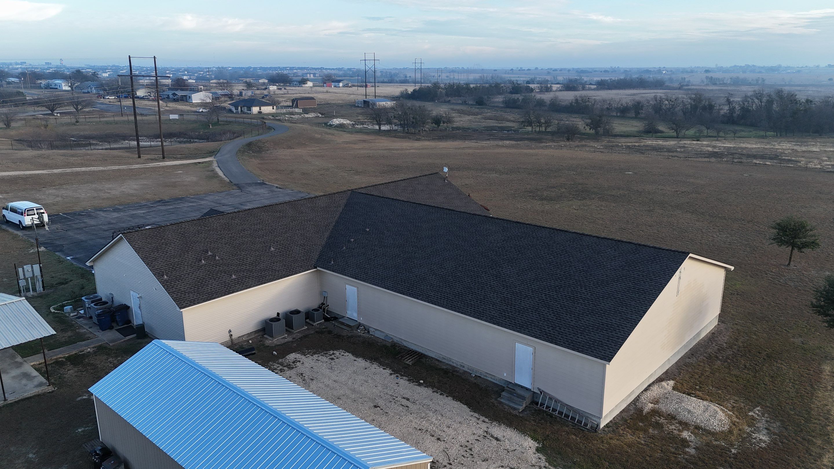 Commercial Roofing Installation using GAF - HDZ - Weathered Wood by Action Exteriors Austin