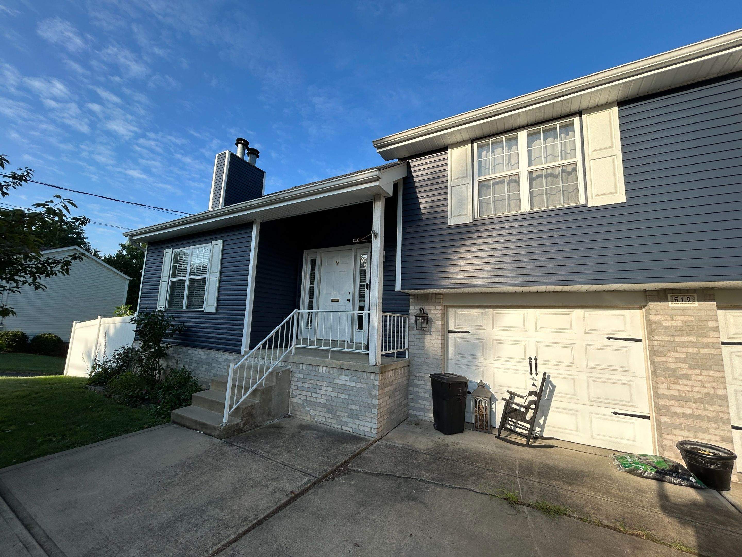 Vinyl Siding Renovation and Stone Veneer Upgrade in Carnegie by Ideal Siding Pittsburgh