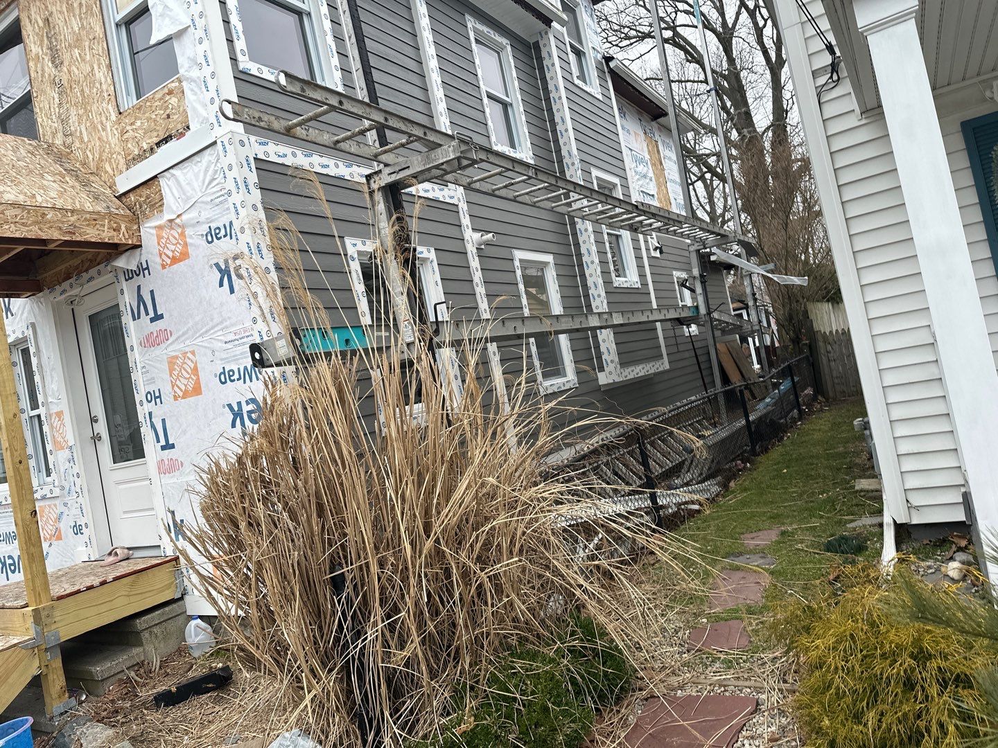 Siding Installation using Hardie Plank Aged Pewter by A Plus Exterior