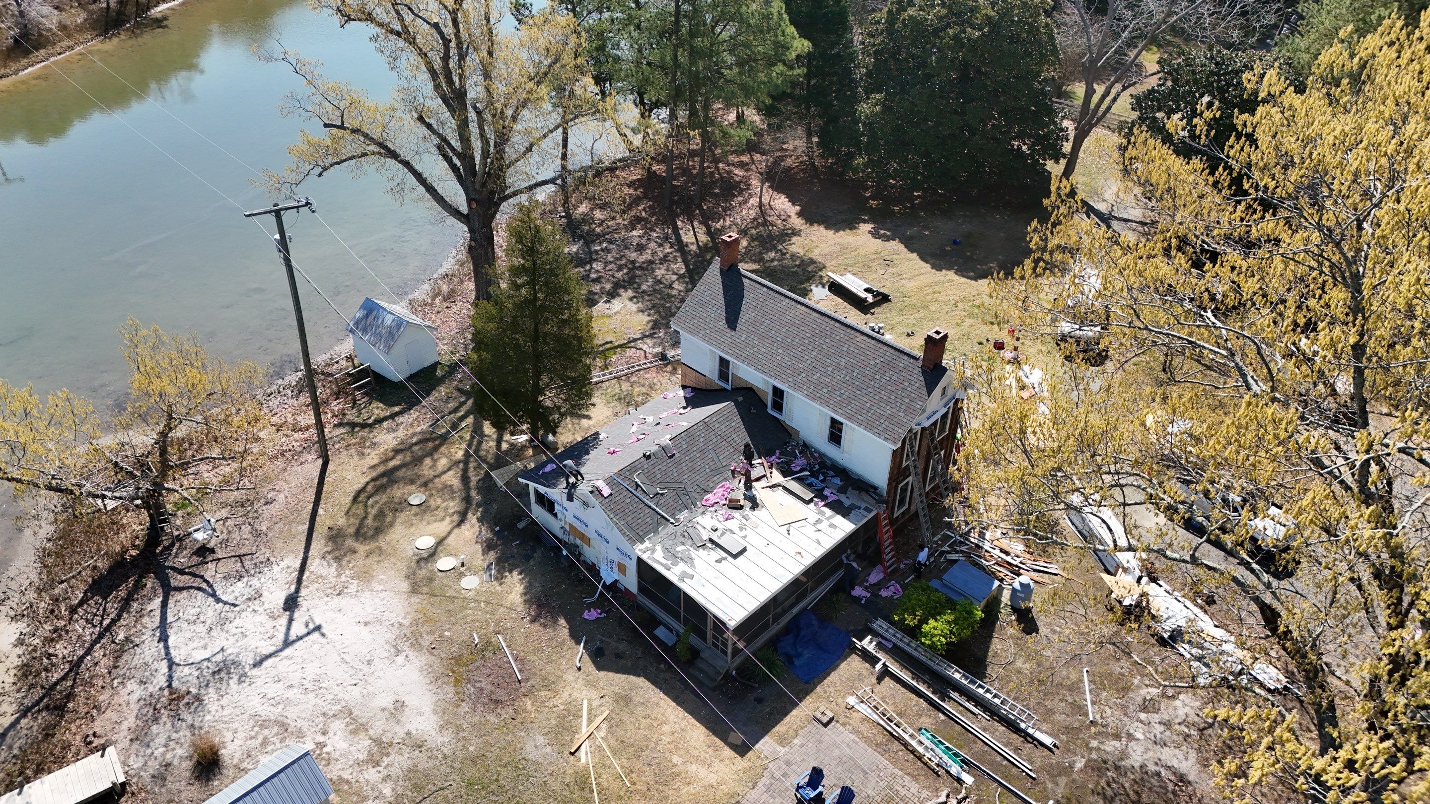 Waterfront Exterior Renovation in Port Haywood by Cade Construction