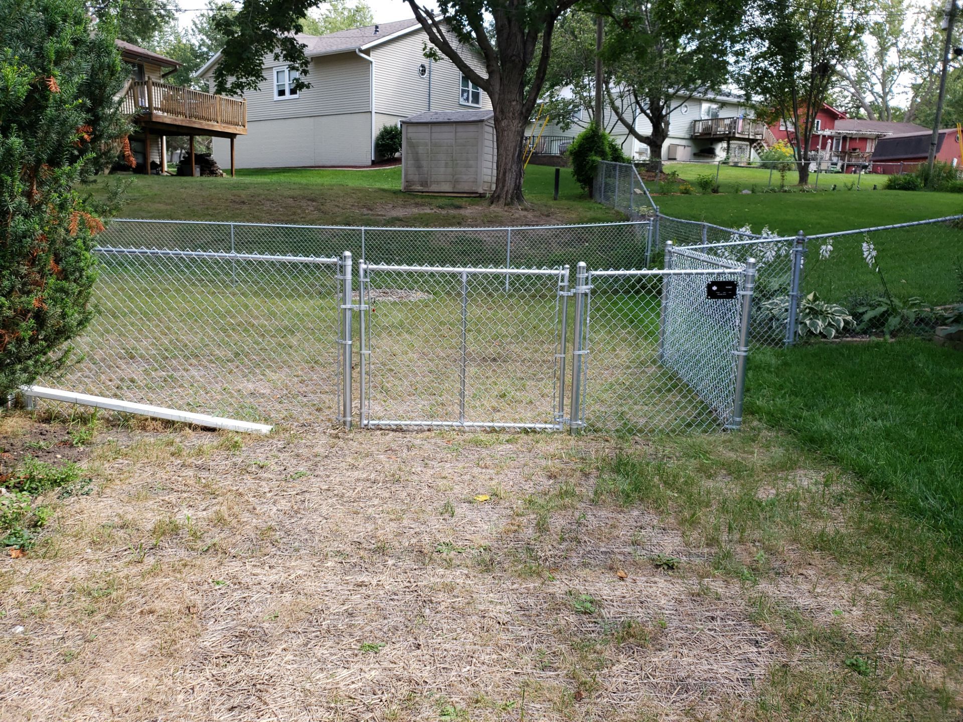 Galvanized Chain Link Backyard Fence and Gate Installation in Cedar Falls by Perfect Picket Fence and Stain