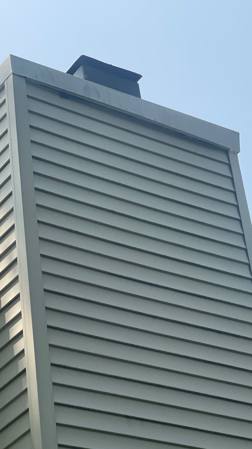 Gutter Cleaning Chimney top repair by A Plus Exterior