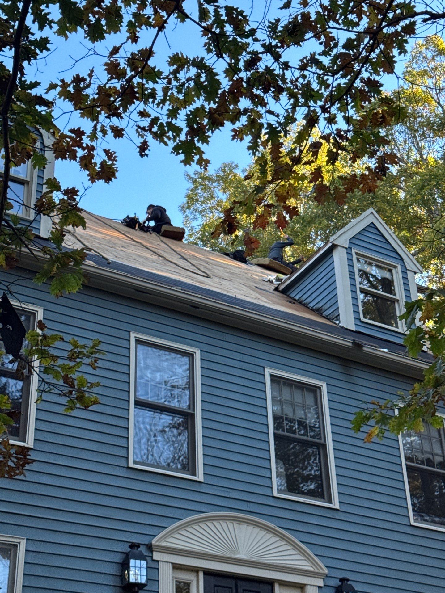 Milford Complete Roof Replacement with Velux Skylight Upgrade by Mighty Dog Roofing of Greater Middlesex County