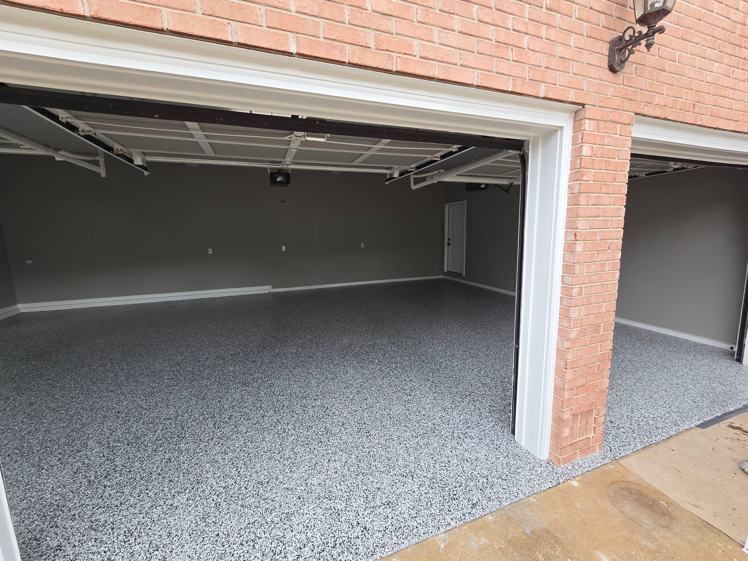 Garage using Domino by Elite Floor Solutions