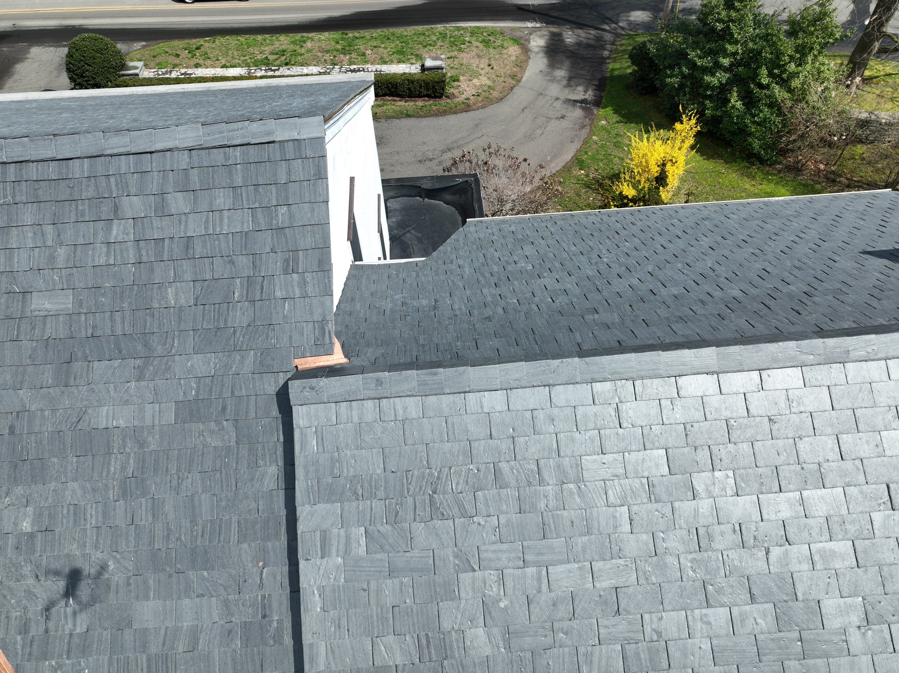 Residential Roofing Installation using Vermont Slate by A Plus Exterior