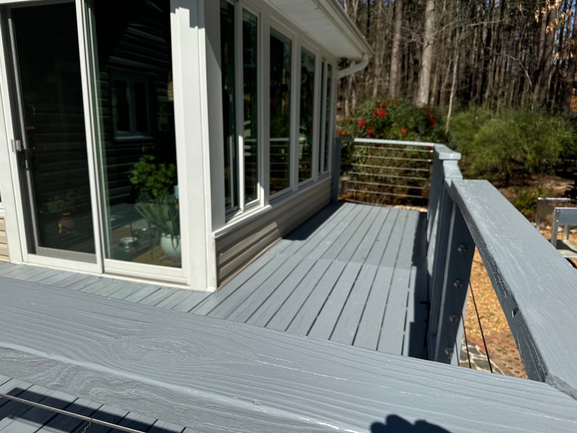 Deck staining by GonzalezPainters & Contractors Inc 