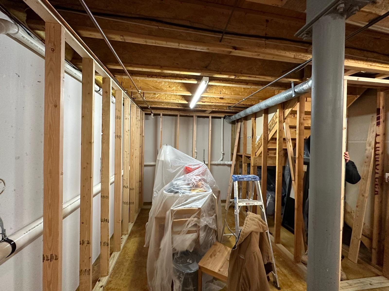 Basement Remodel using Wood by Home Concepts Construction