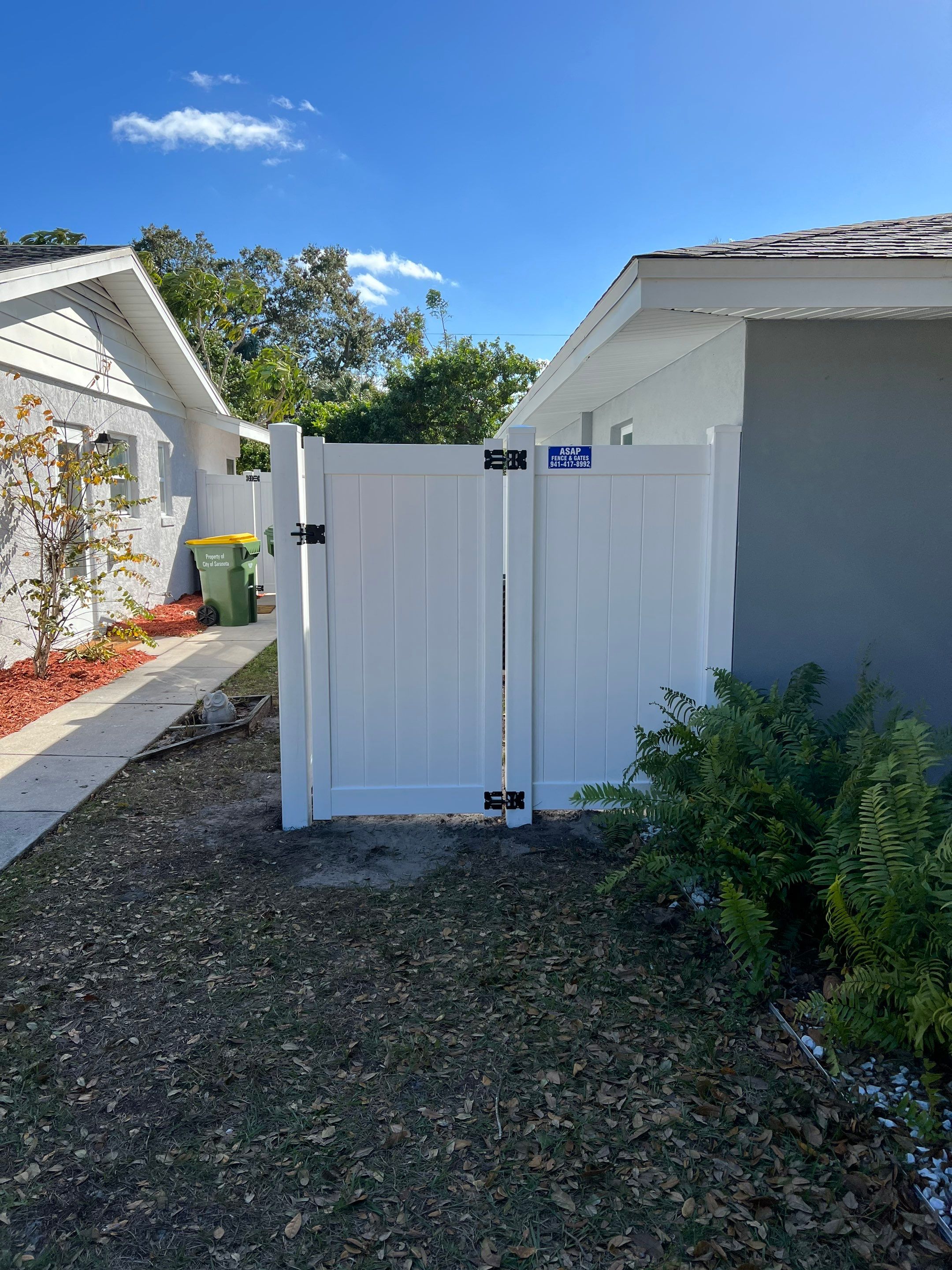 Vinyl Privacy Fence With AC Enclosure and Storage Corral by Asap fence and gates, LLC