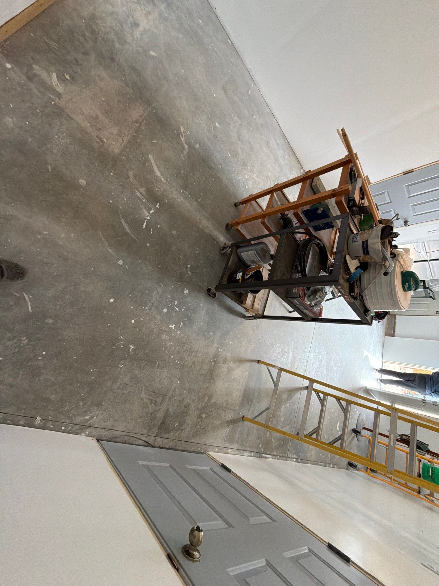 Decorative Chip Concrete Coating Installation in Luverne by Select Painting, Coatings & Garage Cabinets