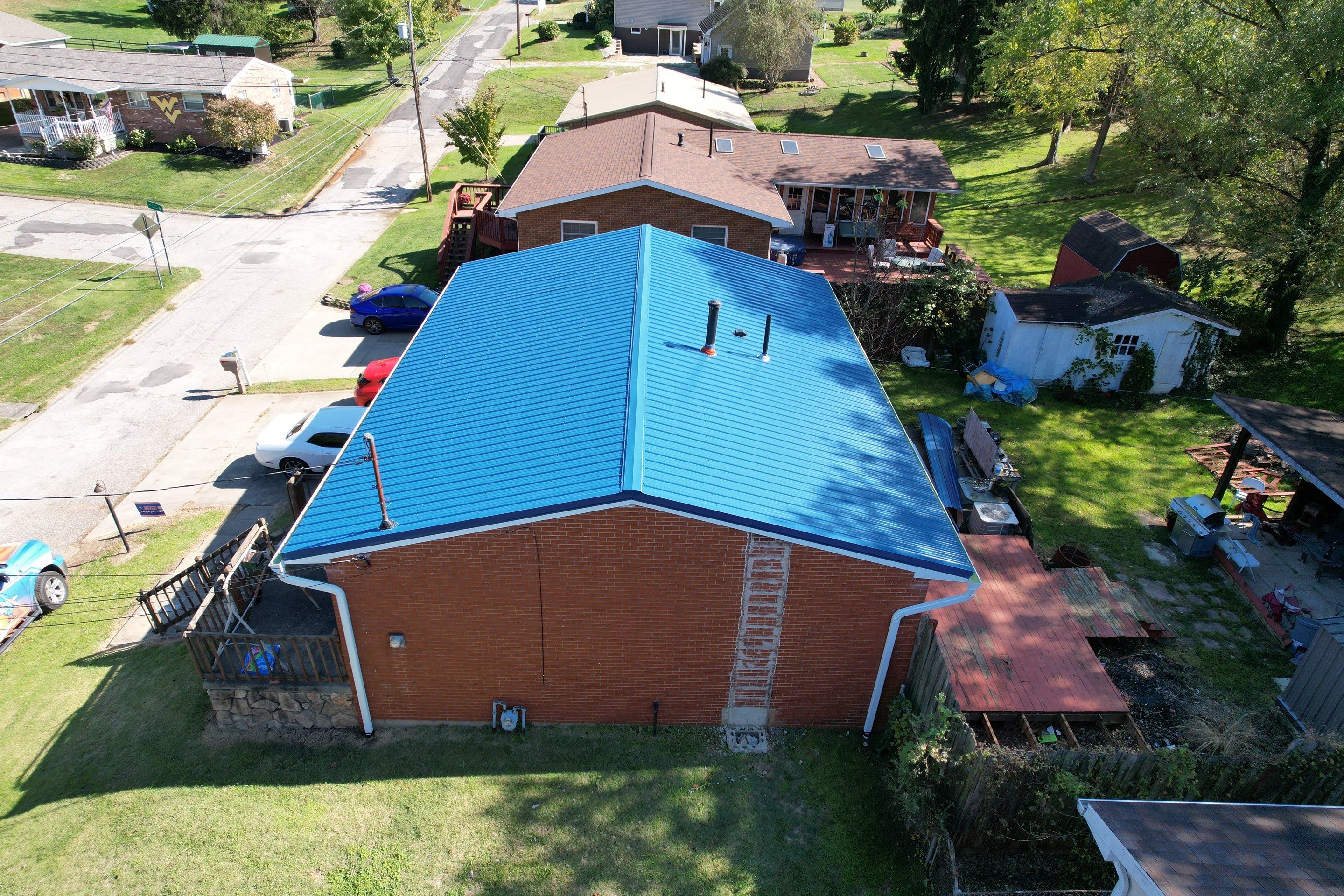 Residential Roofing Installation using Metal by Rainstoppers Roofing