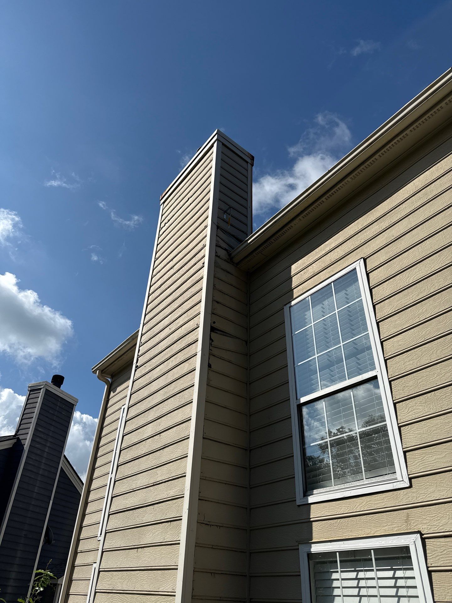 Chimney Siding Replacement and Exterior Painting in Duluth, GA by Nelson Exteriors 