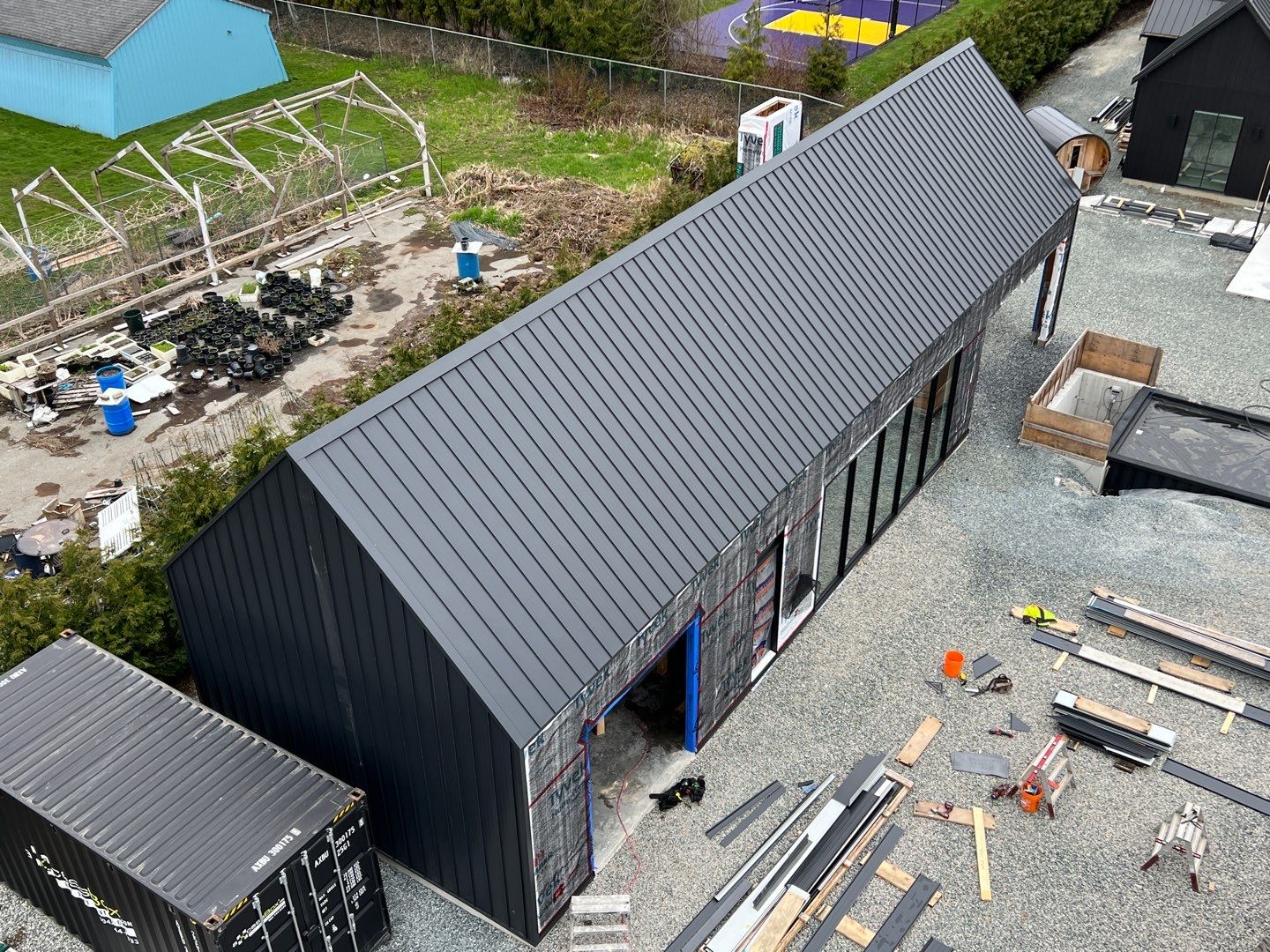 Residential Roofing and siding Installation using 12" Prolok metal  by Top Notch Roofing Inc