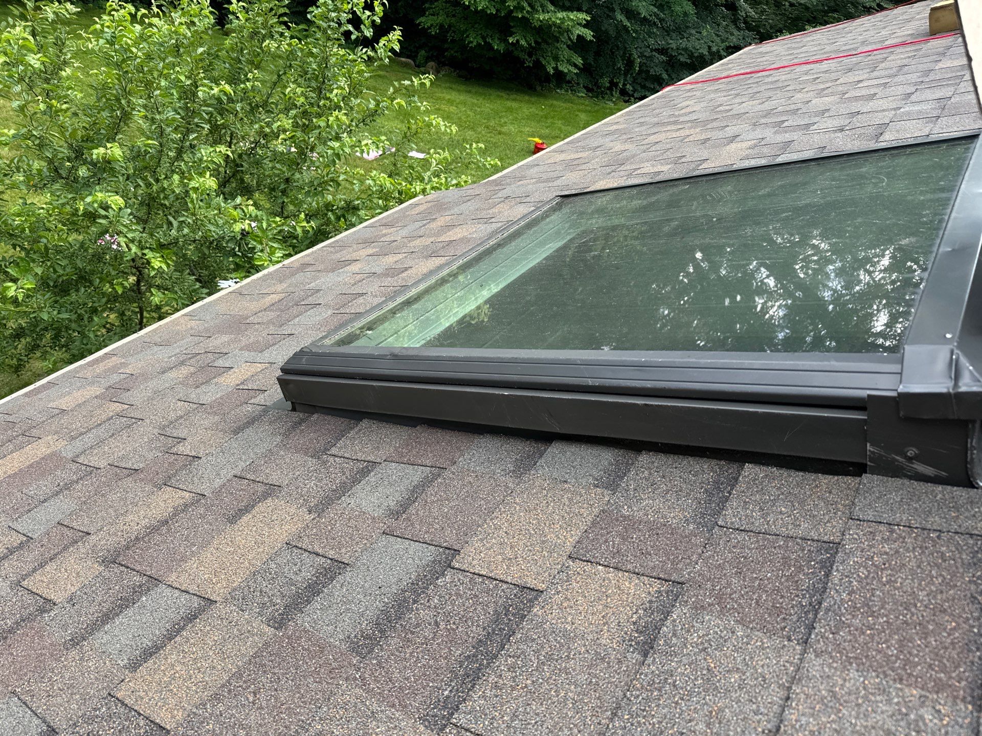 Amherst NH Roof Replacement with Owens Corning Duration Teak Shingles and Velux Skylights by Compass exteriors