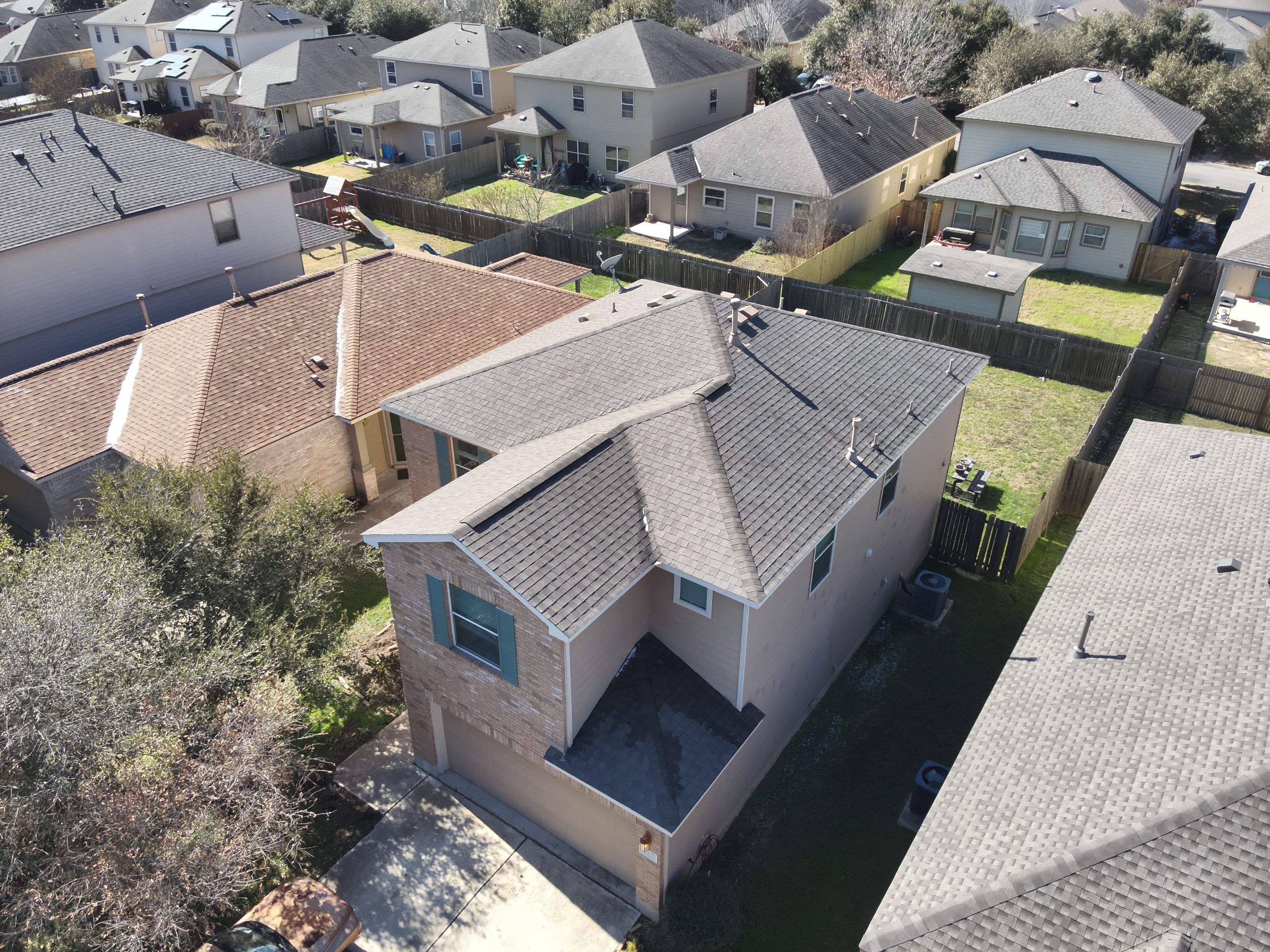 Residential Roof Replacement using Owens Corning - Duration - Driftwood by Action Exteriors Austin