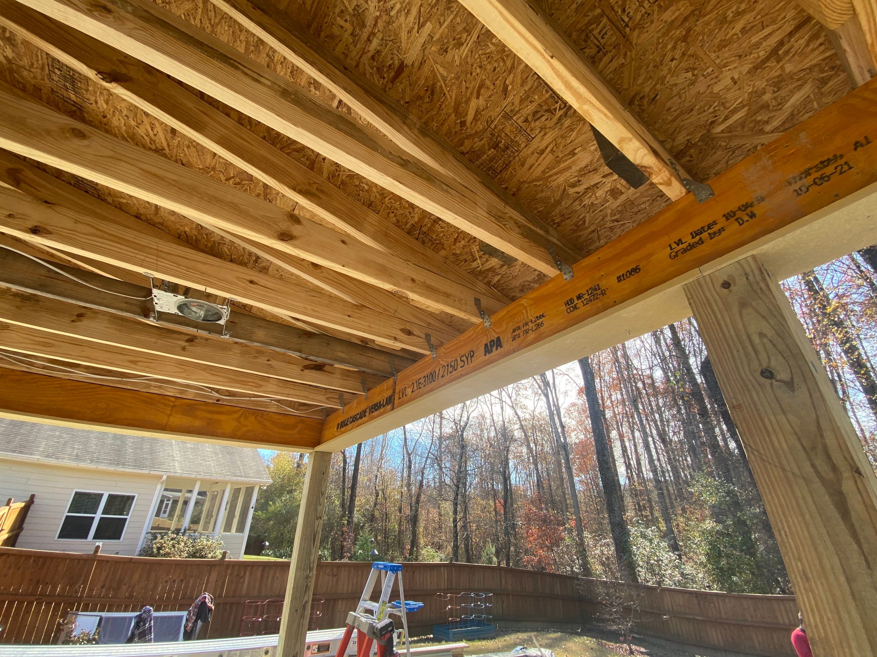 Screened-In Porch Construction With White Beadboard Ceiling In Cumming by Swift Home Renovations 