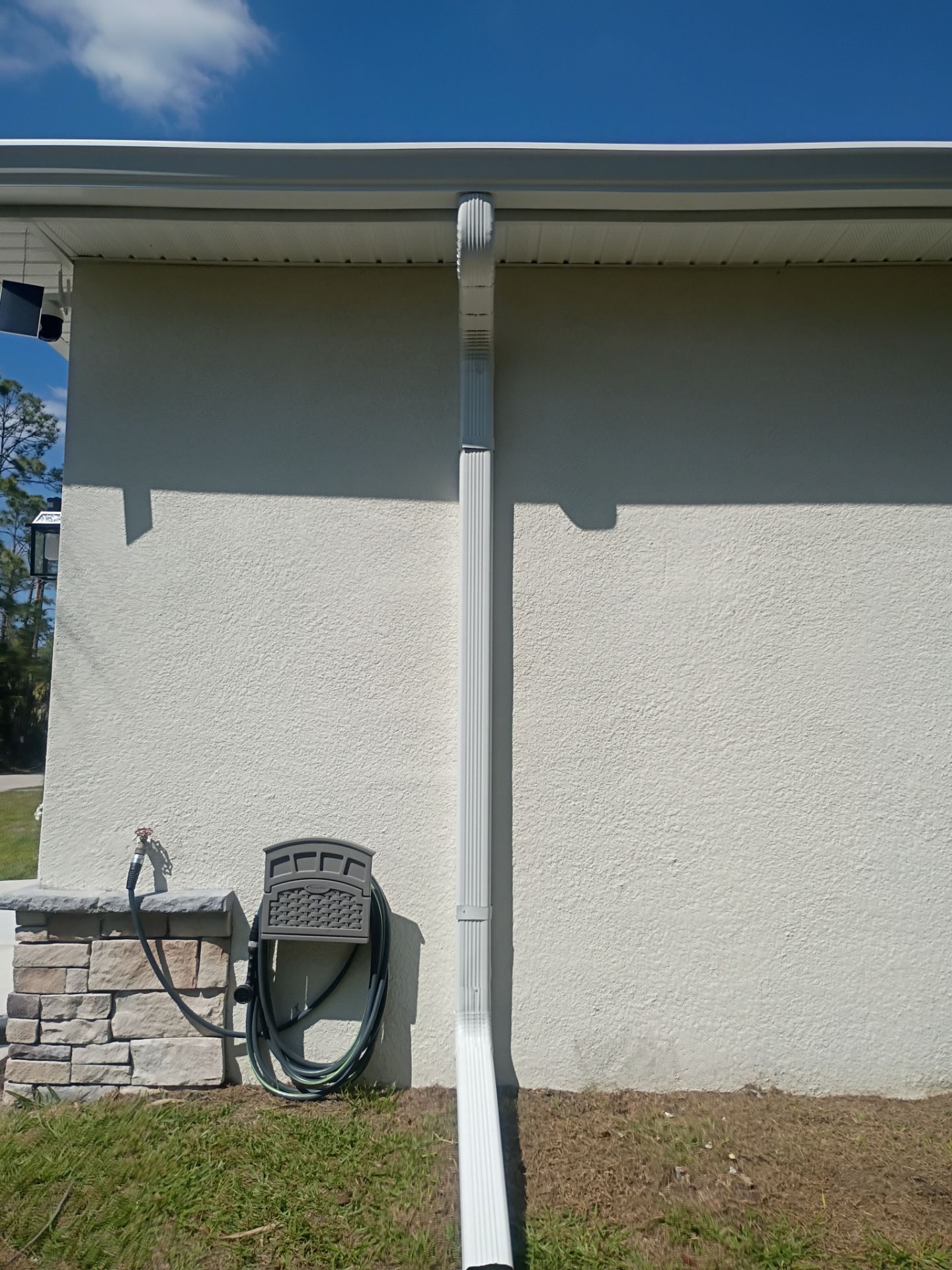 6-inch K-style White Seamless Gutters with Downspouts in North Port, FL by Gutter Professors