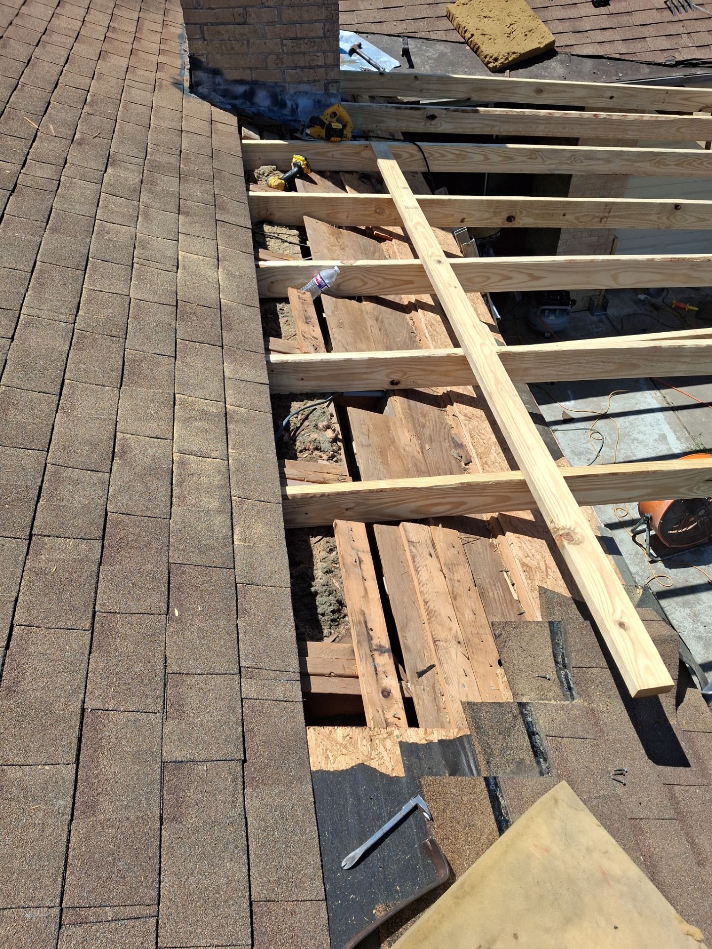 Chimneys need a Cricket.  by Bayfront Roofing and Construction