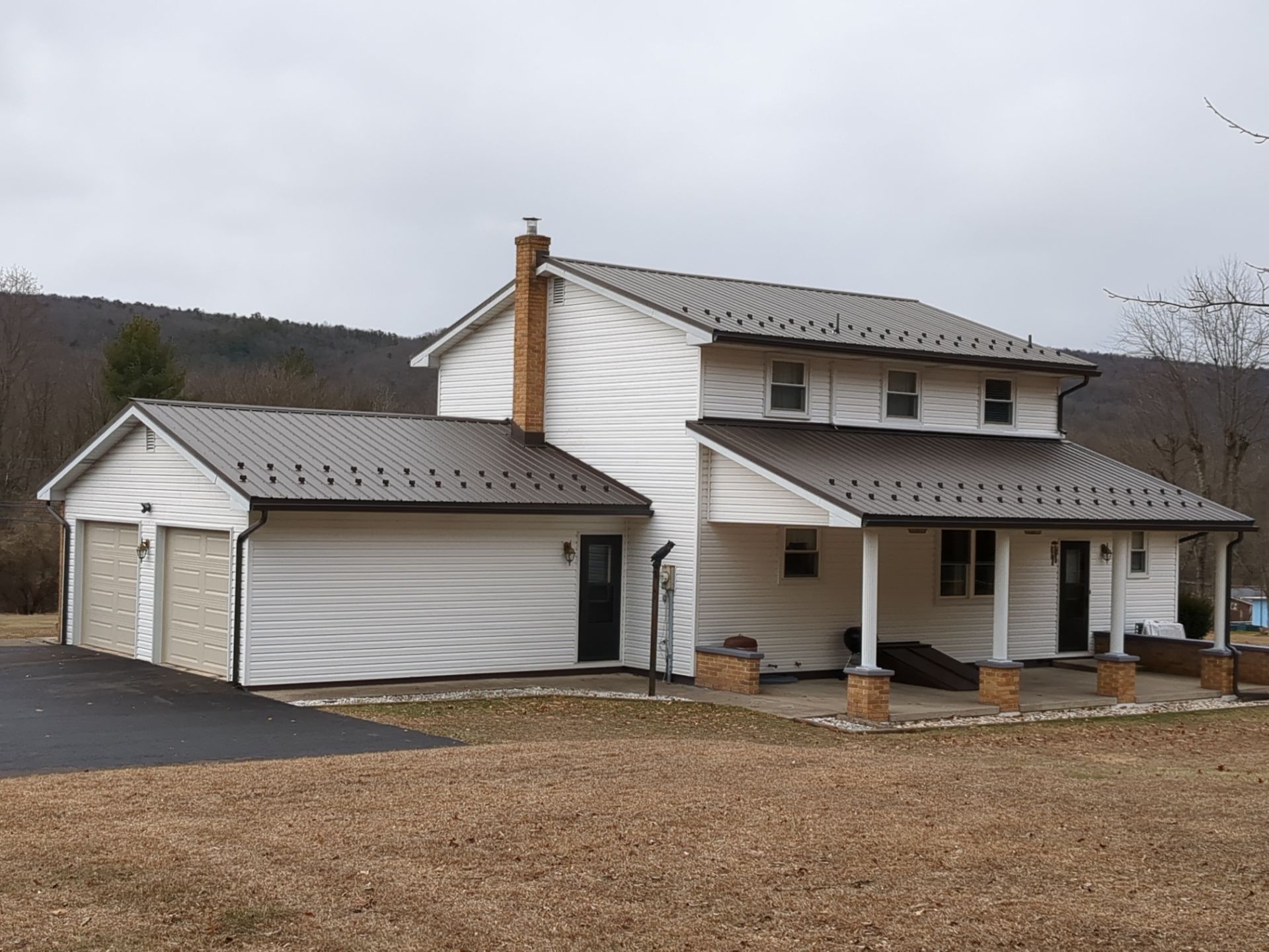 AB Martin Metal Roof Installation-Black by Esh Builders