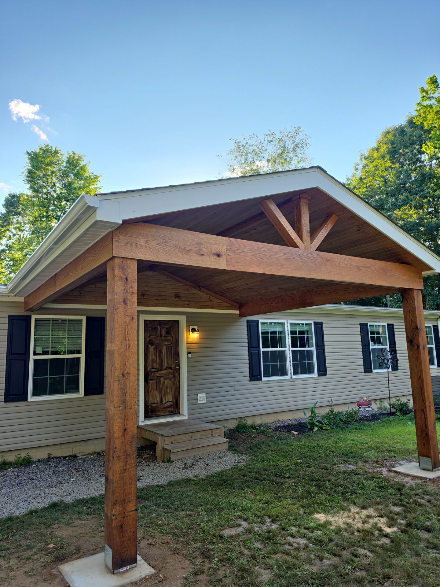 Custom Timber Frame Gable Porch Addition in Leechburg by Cousins Roofing Siding & Decks