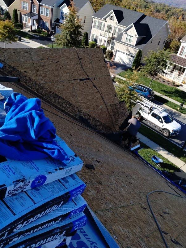Residential Roofing Installation using Atlas Pinnacle Pristine Black Architectural Shingles by Frederick Roof Repair