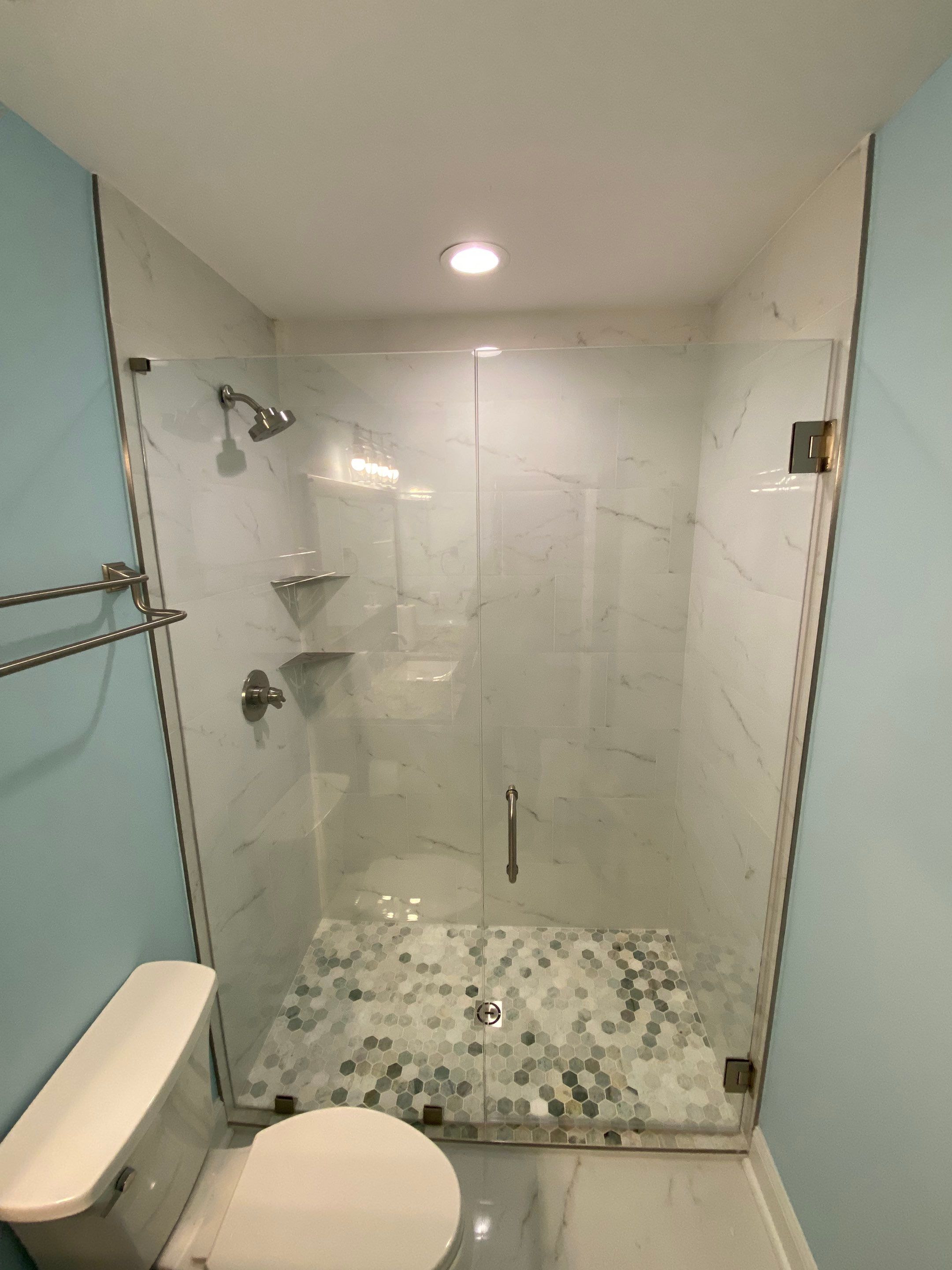 Marietta Basement Remodeling Featuring Custom Wet Bar and Marble Shower by Swift Home Renovations
