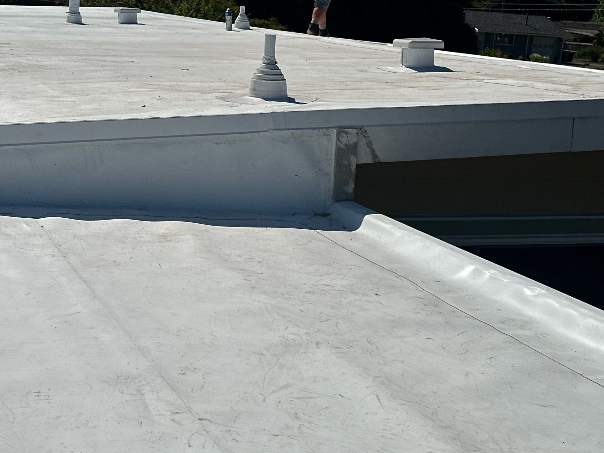 Residential Flat Roof Installation using GAF 60Mil TPO  by Orezona Building & Roofing Company, Inc.