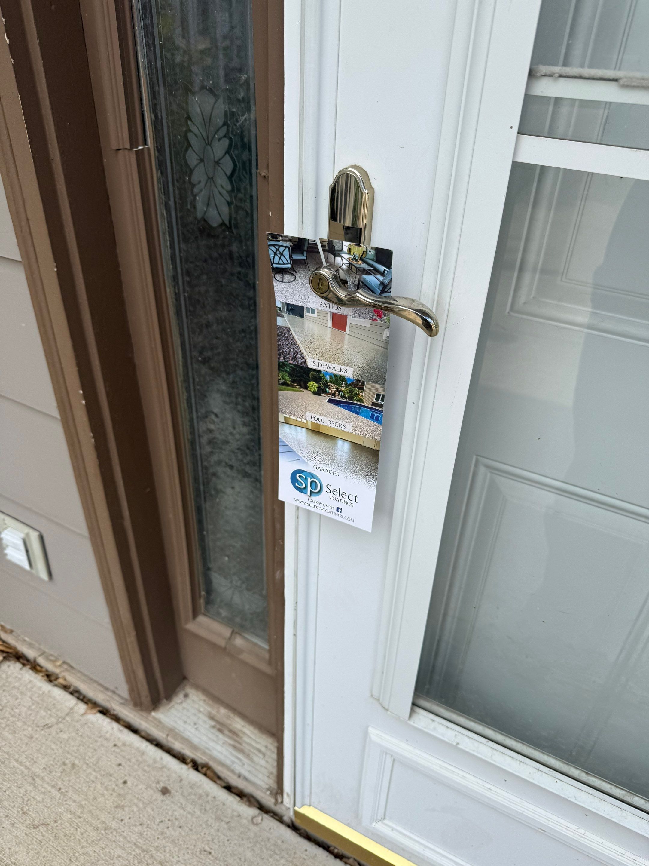 Grey Polyaspartic Porch and Stair Resurfacing in Sioux Falls by Select Painting, Coatings & Garage Cabinets