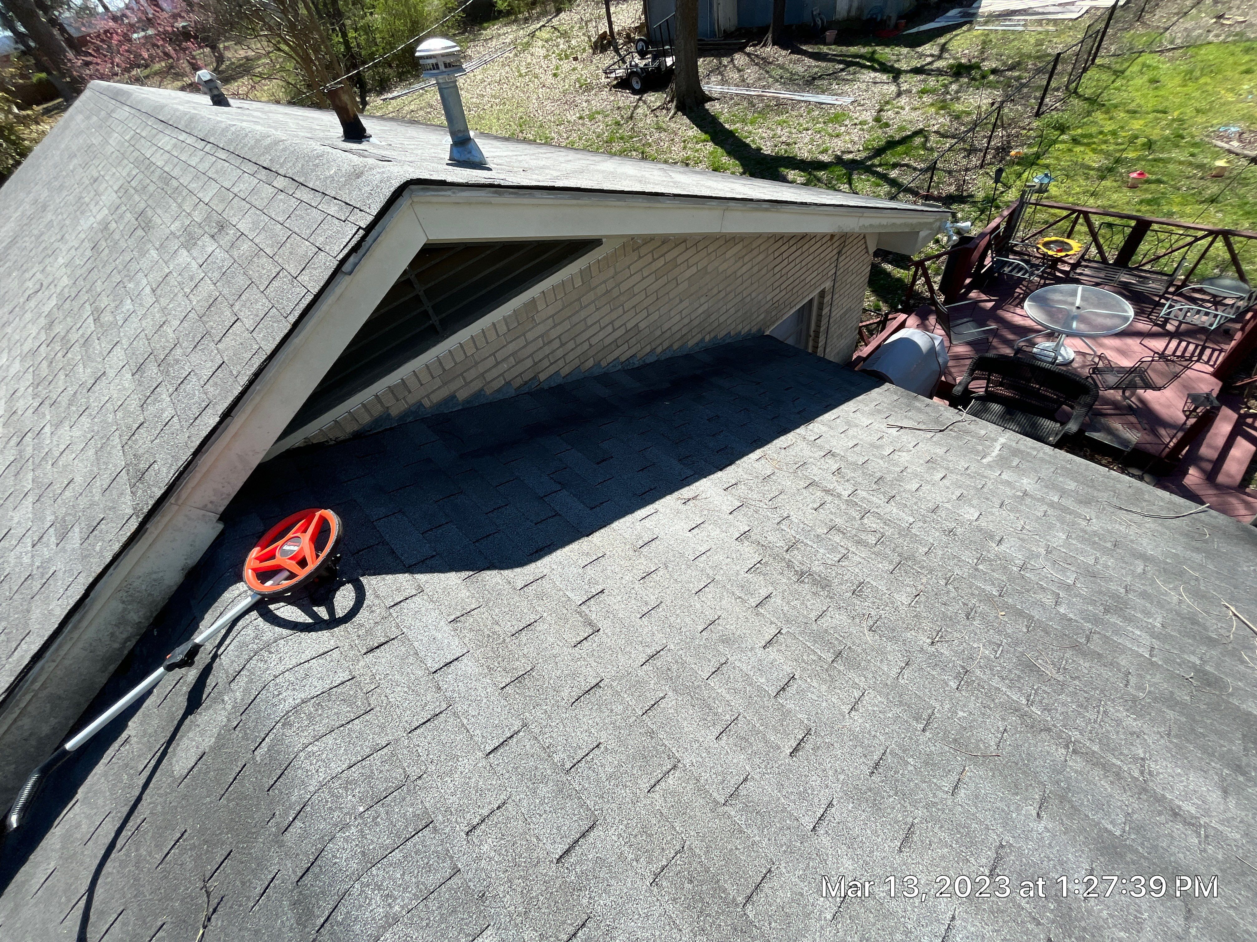 Residential Roofing Installation using 26 Gauge Colored Panels by Hostetler Roofing