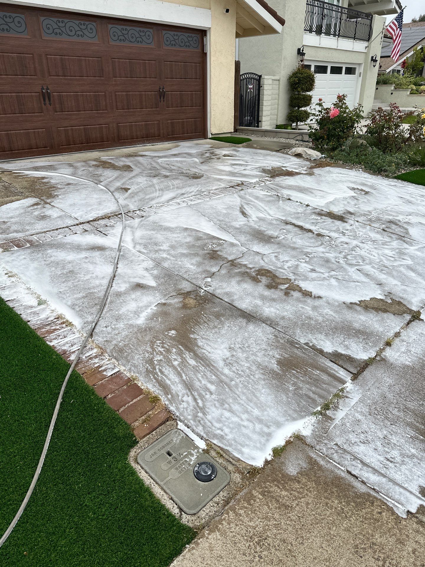 Orange County driveway restoration pressure washing by Property Cleaning Experts, LLC