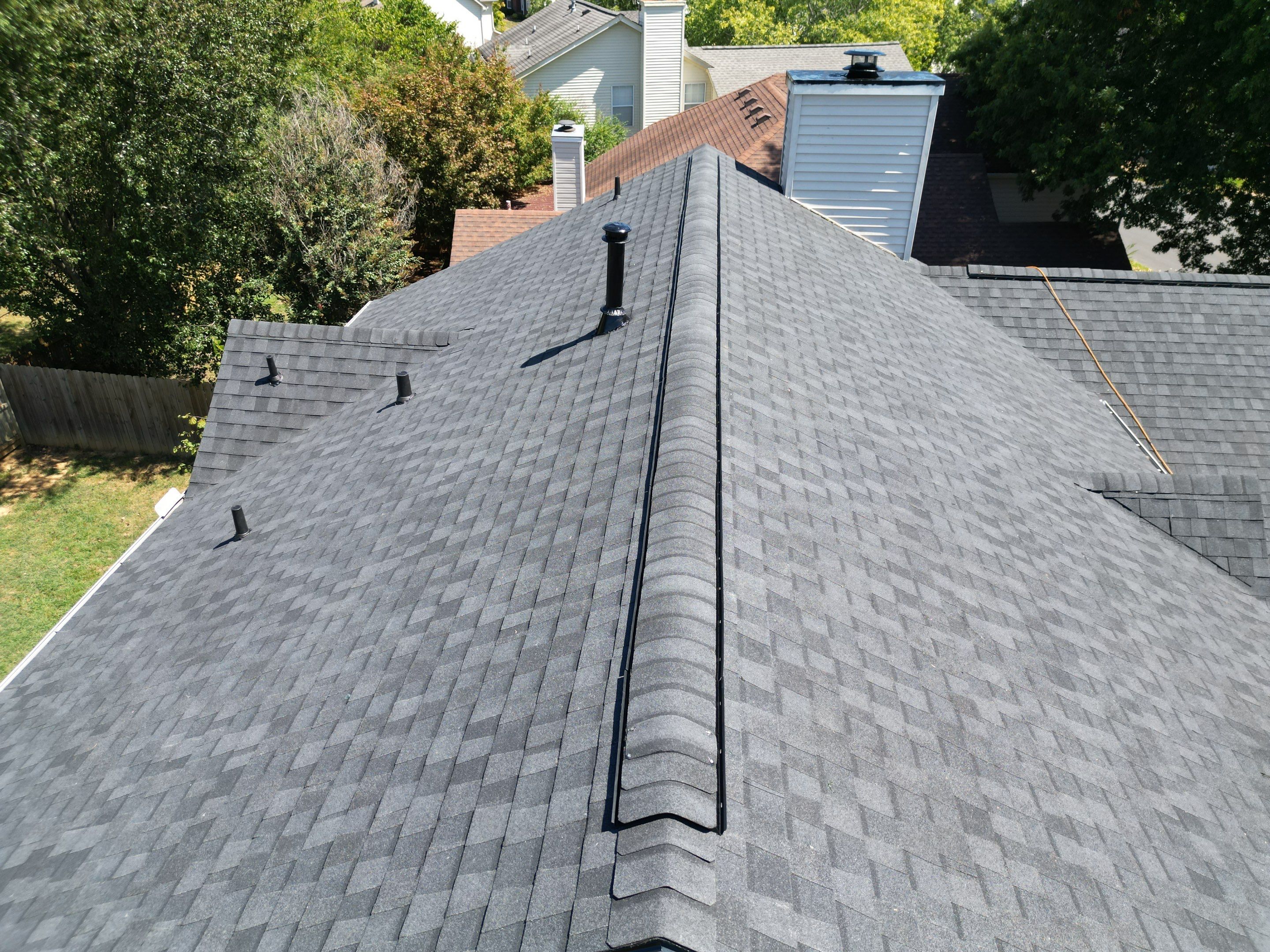 Moire Black Re-Roof by Royal House LLC