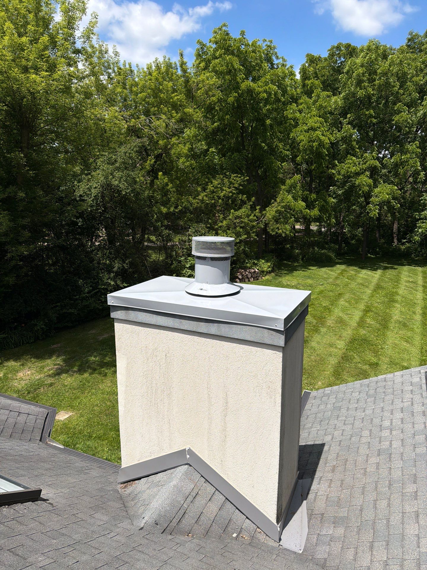 Powder Coated Stainless Steel Chase Cover Installation by Leonard and Sons Building Services, Inc.