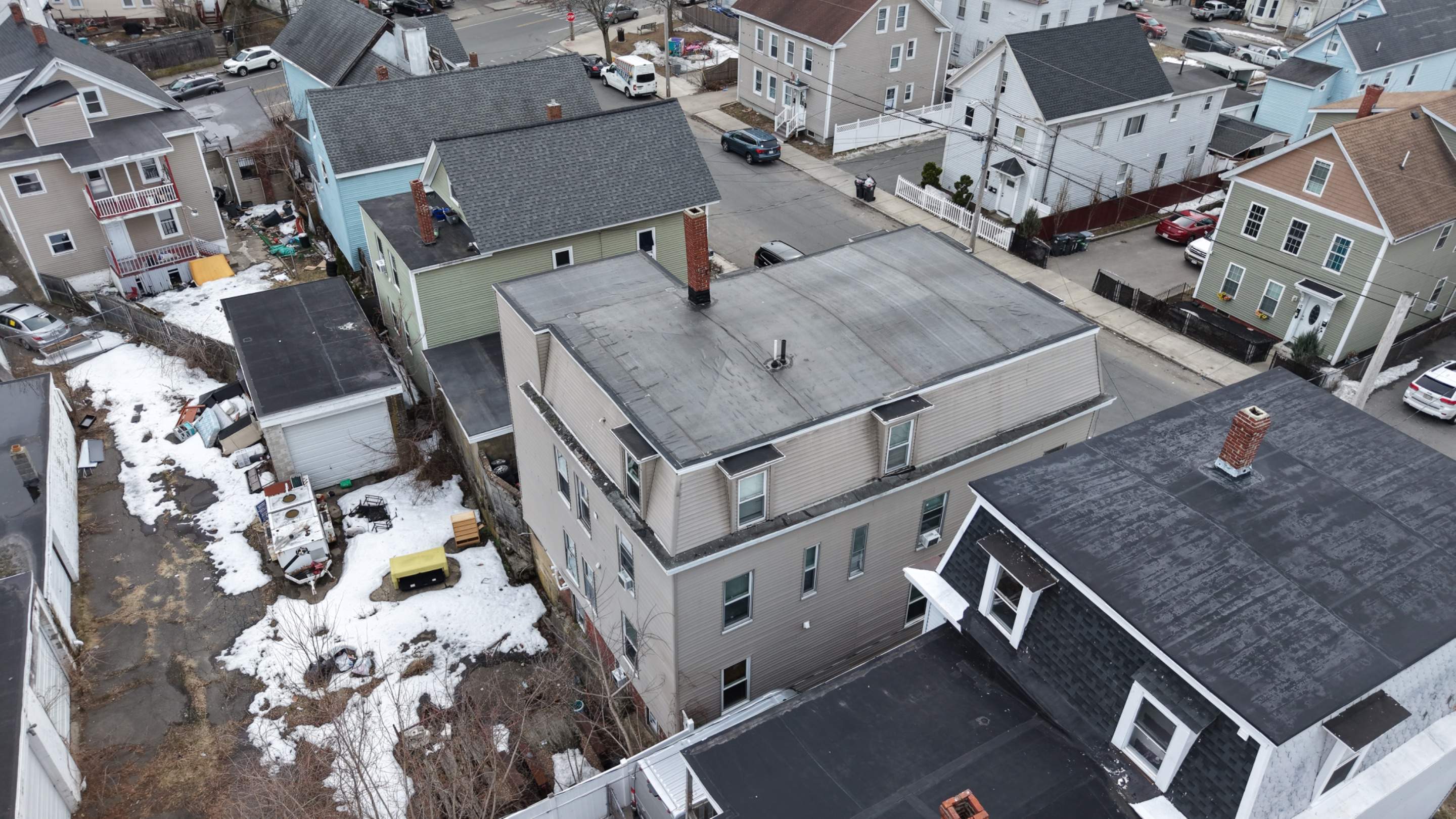 Gravel Roof Tear-Off & EPDM Rubber Roof Conversion in Haverhill, MA by JOHNNYS PRO
