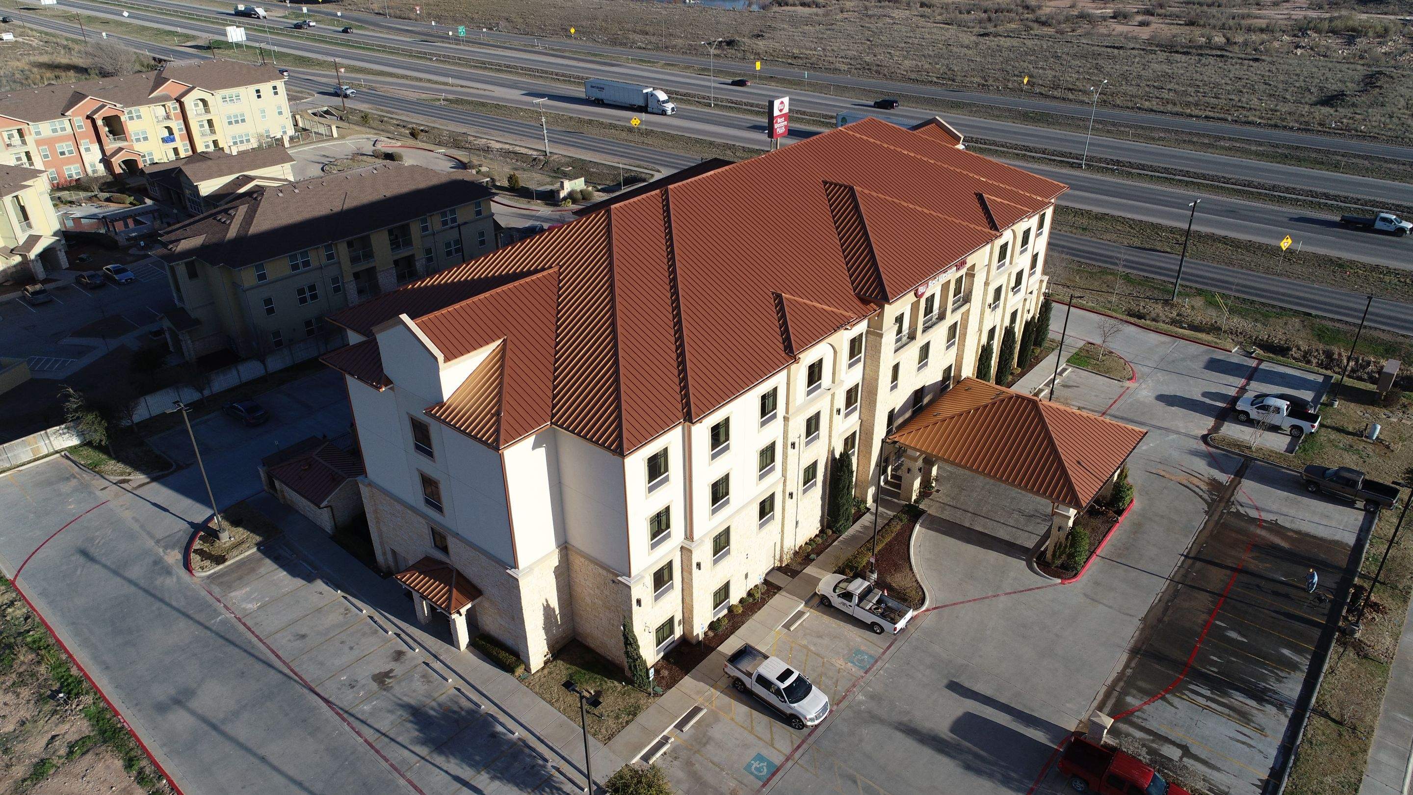 Commercial Roof Replacement for Best Western using Standing Seam Roofing - Midland, TX by Roof Experts