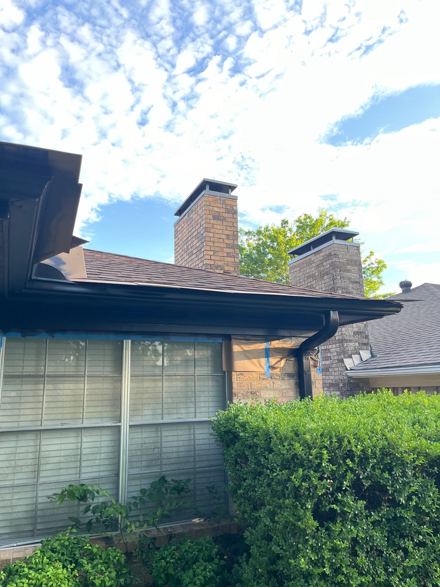 Exterior Painting in Tyler, TX | Eaves, Door & Columns in Elegant Black by Quality Coats Painting