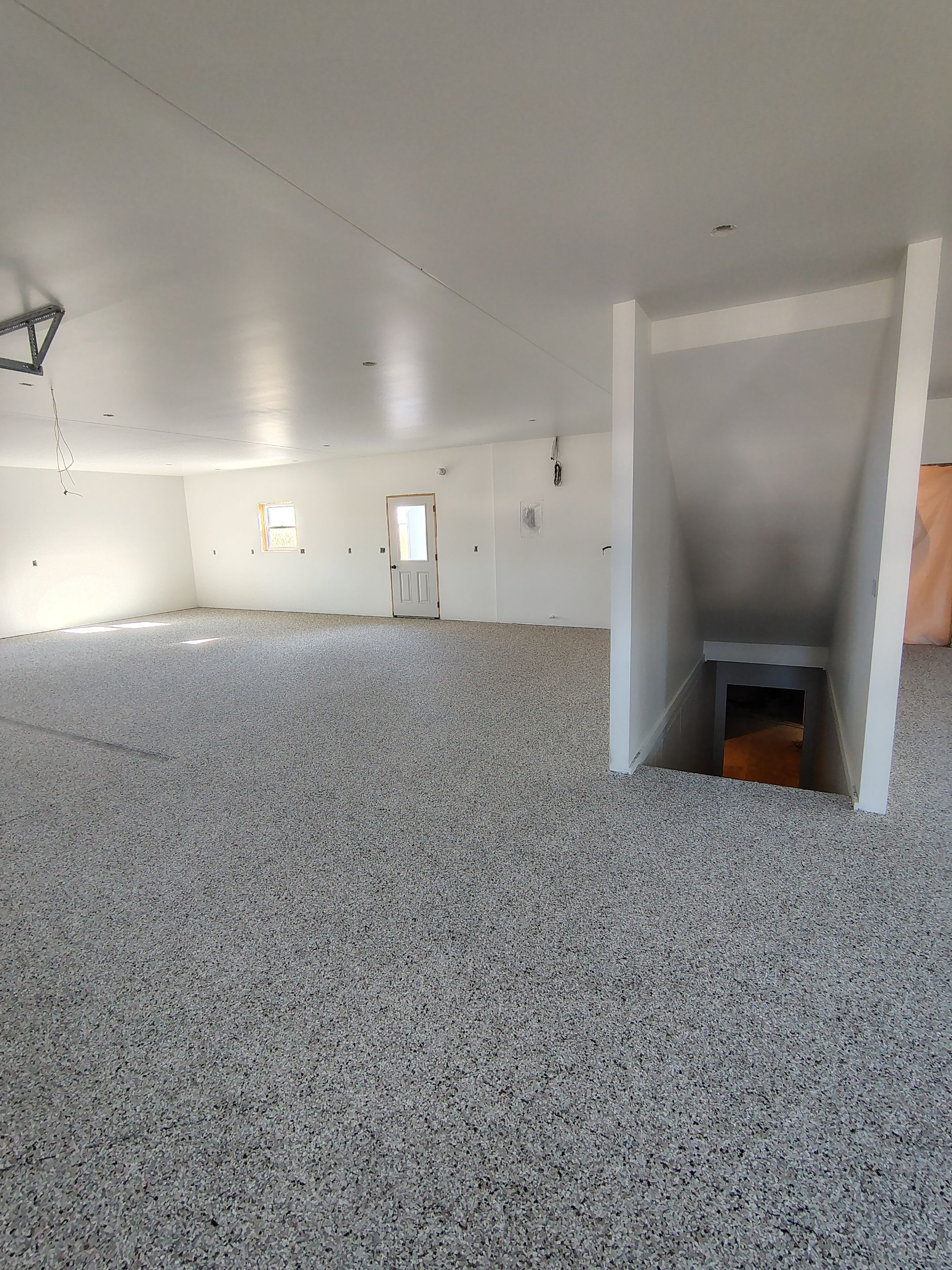 Custom Garage and Basement Epoxy Floor Coating in Menno by Select Painting, Coatings & Garage Cabinets