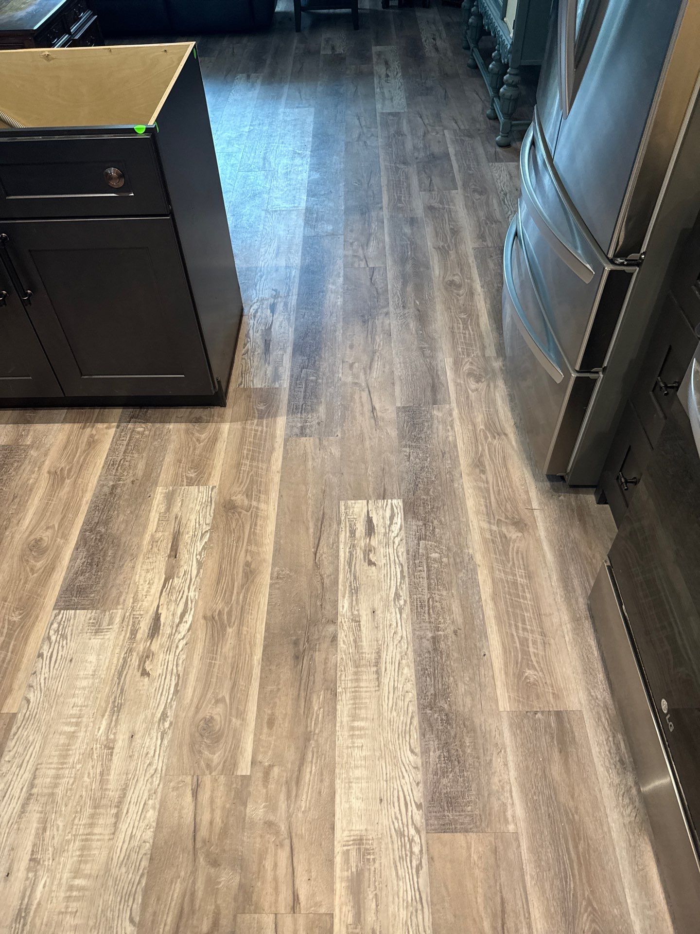 LVP kitchen floor upgrade by Vrmmm Flooring