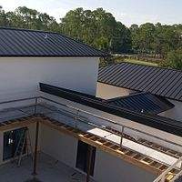 24ga 1.5 Mechanical Seam Matte Black  by Total Roofing System The Metal Roof Experts