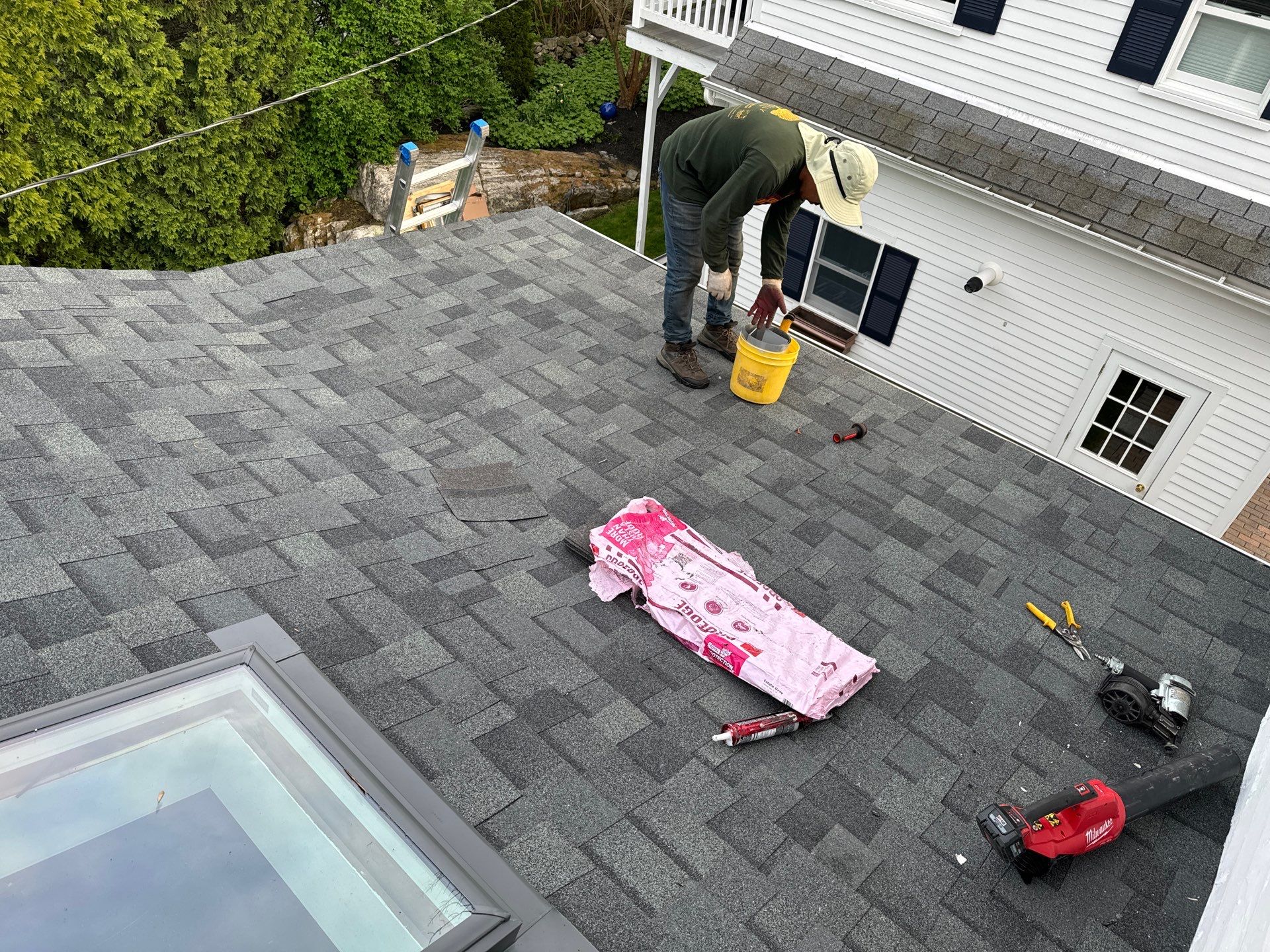 Six Squares of Owens Corning Shingles, and a Velux Skylight in New Castle, NH by Tall pine roofing