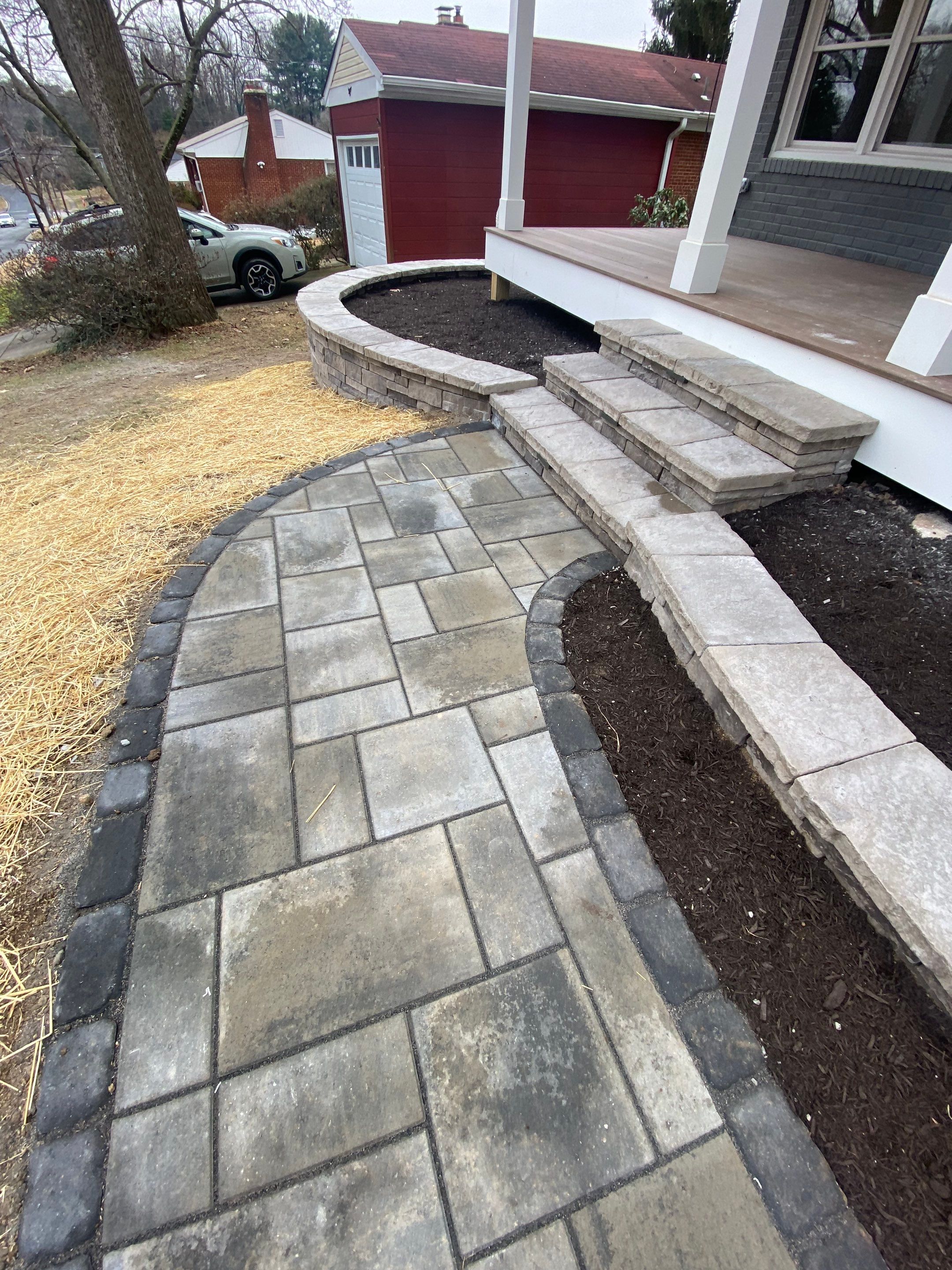 Retaining wall, walkway, small patio and landscape install by The Smet Companies, LLC