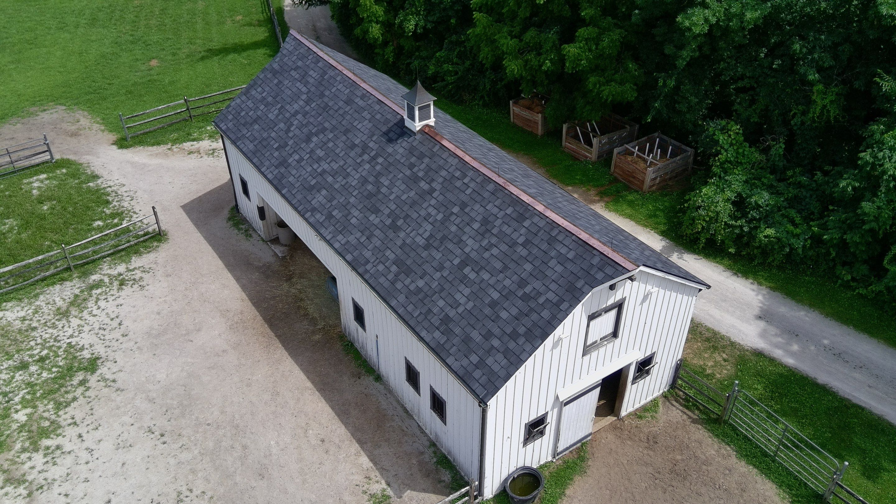 Re-roof: Certainteed Belmont in Black Granite with Custom Copper by Midwest Building Solutions