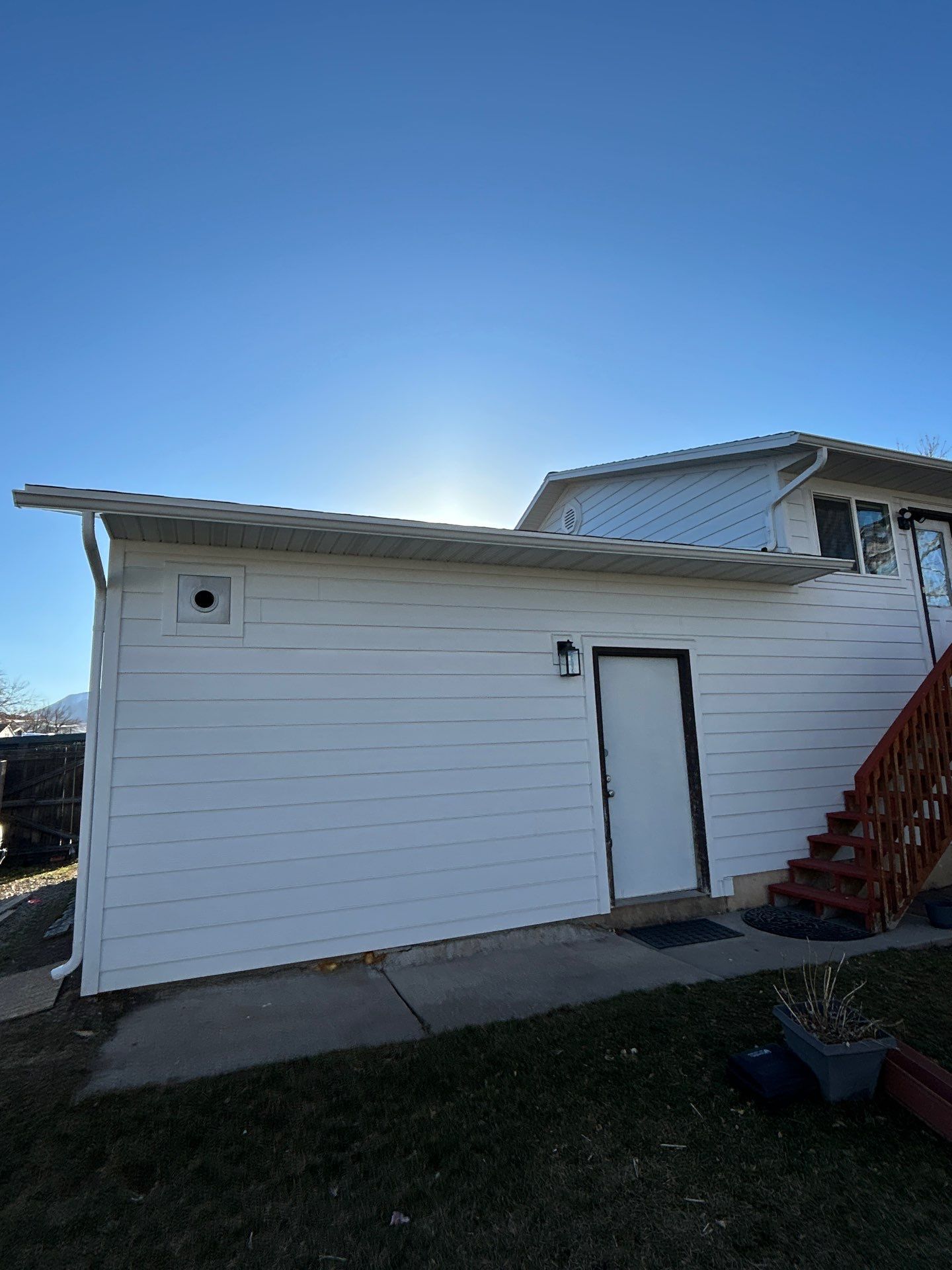 Orem | Crisp Monochromatic Hardie Upgrade | Arctic White by Ideal Siding Utah