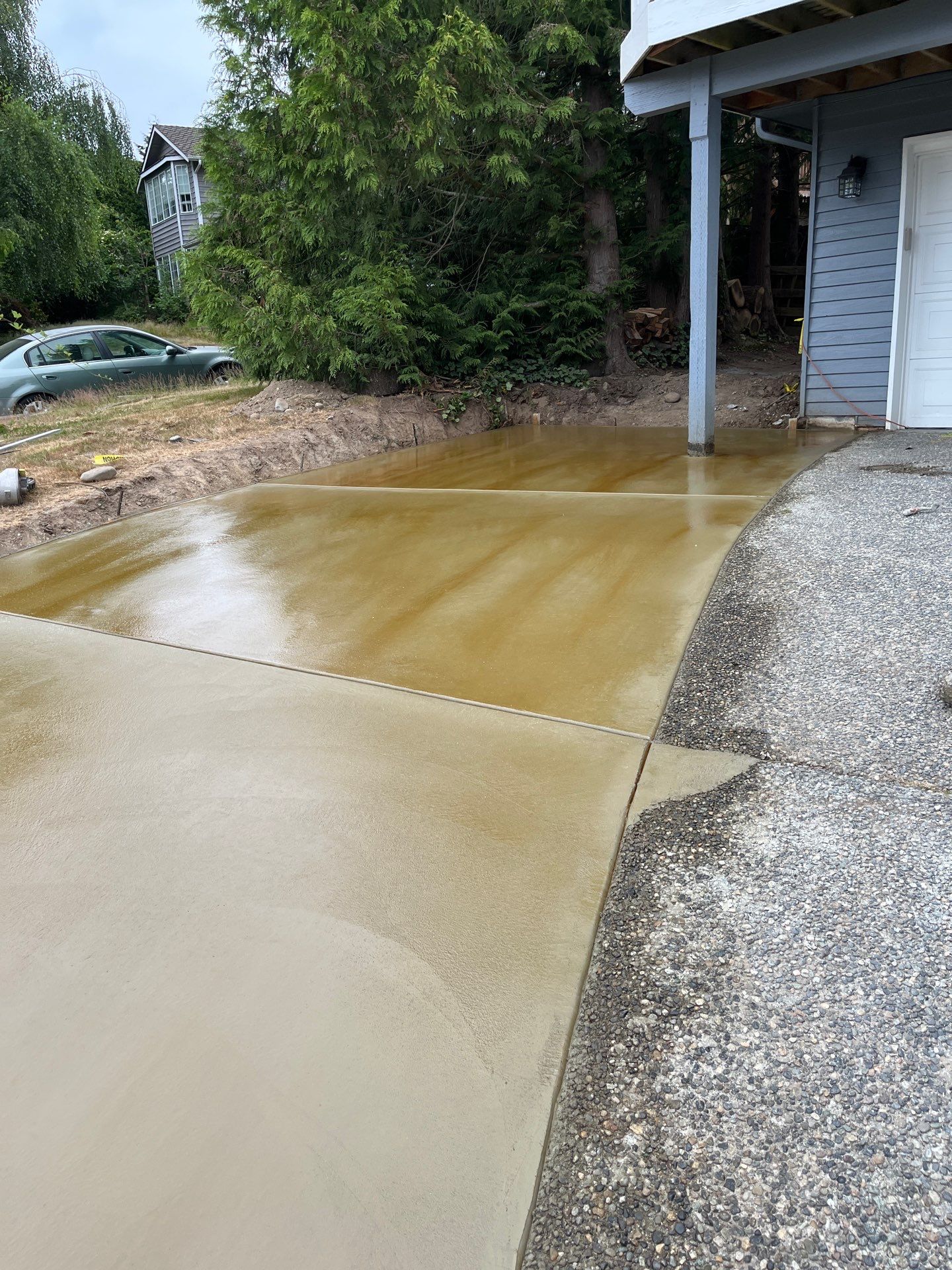 Concrete Back Patio Makeover  by Jireh Asphalt & Concrete Inc 