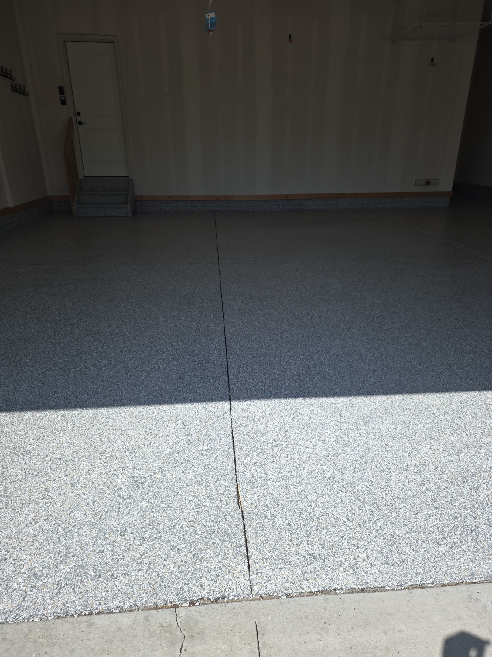 Cumming, IA Garage Floor Coating by Revival Concrete Coatings