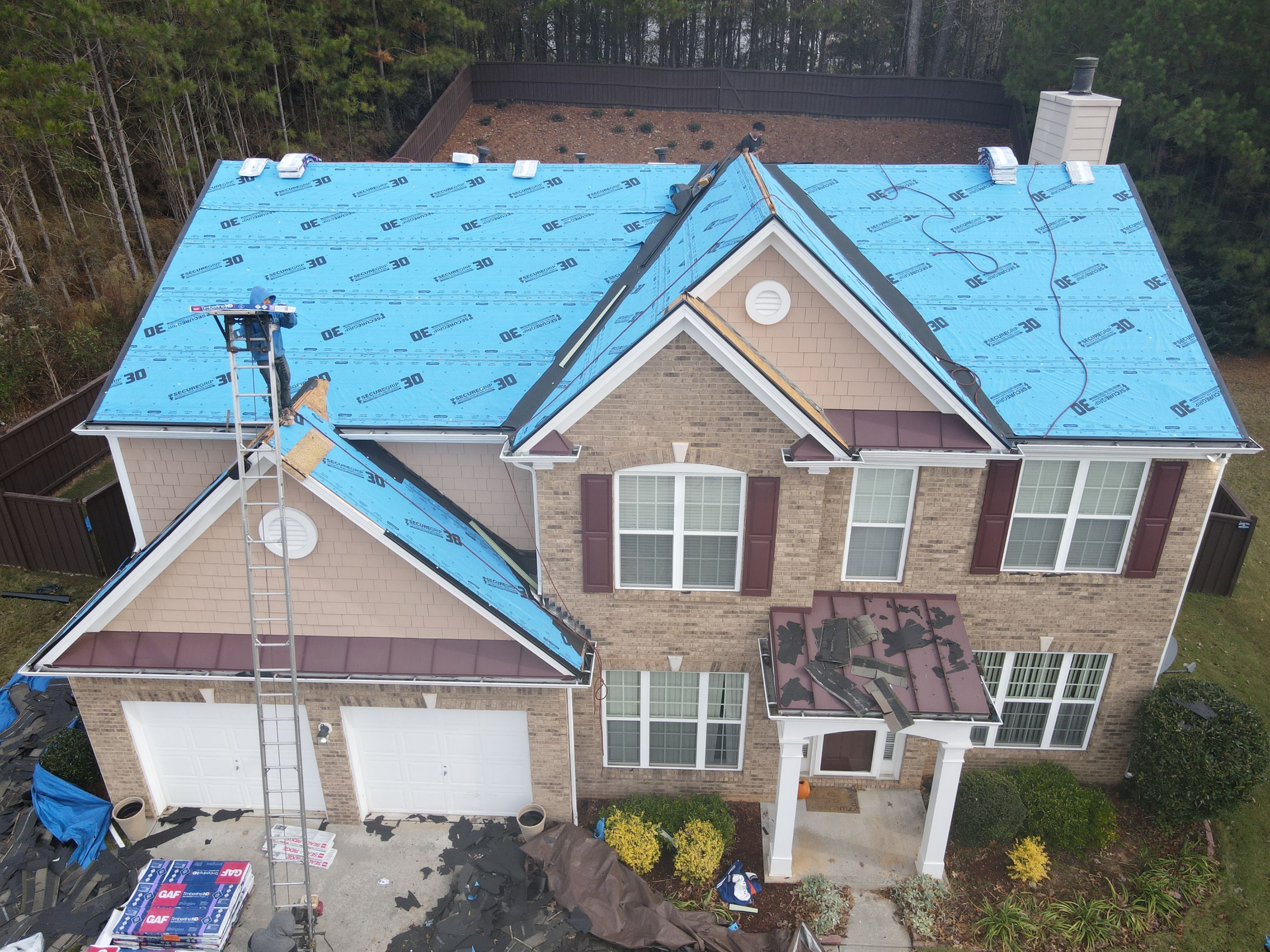 Residential Roofing Installation using Timberline HDZ Hickory  by Inspector Roofing and Restoration